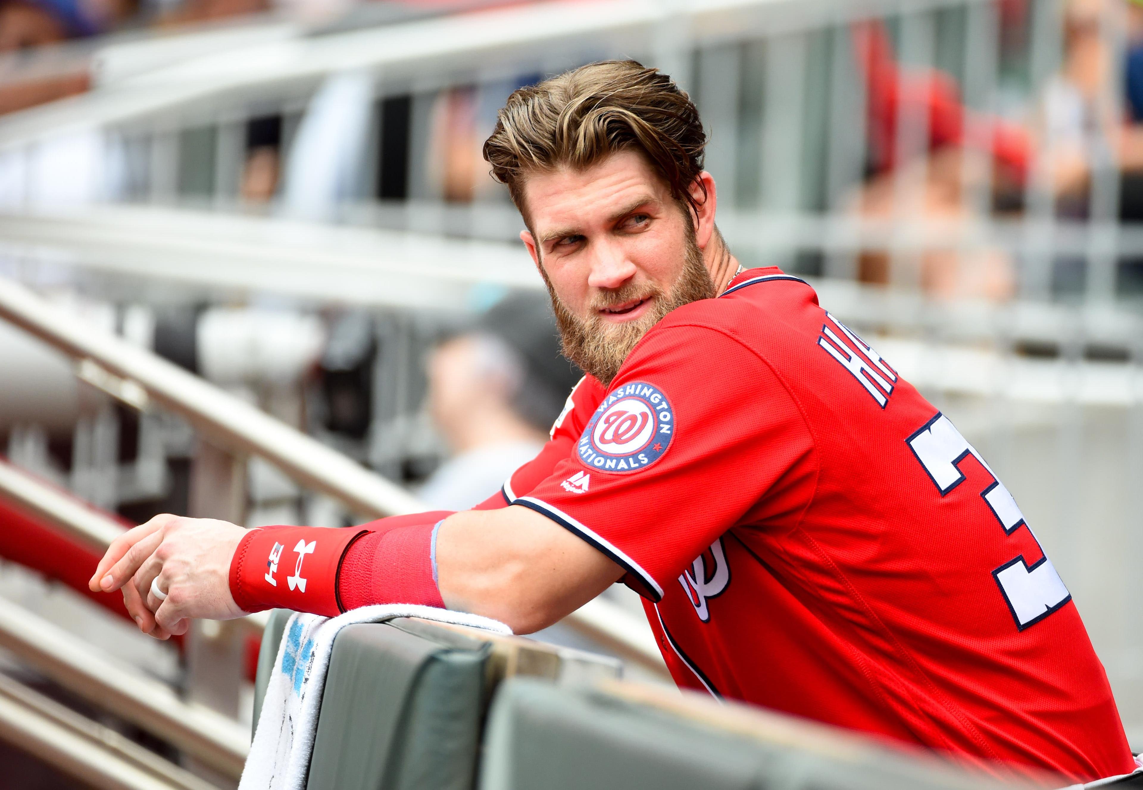 Sep 16, 2018; Atlanta, GA, USA; Washington Nationals right fielder Bryce Harper (34) in the dugout against the Atlanta Braves during the second inning at SunTrust Park. Mandatory Credit: Adam Hagy-USA TODAY Sports / Adam Hagy