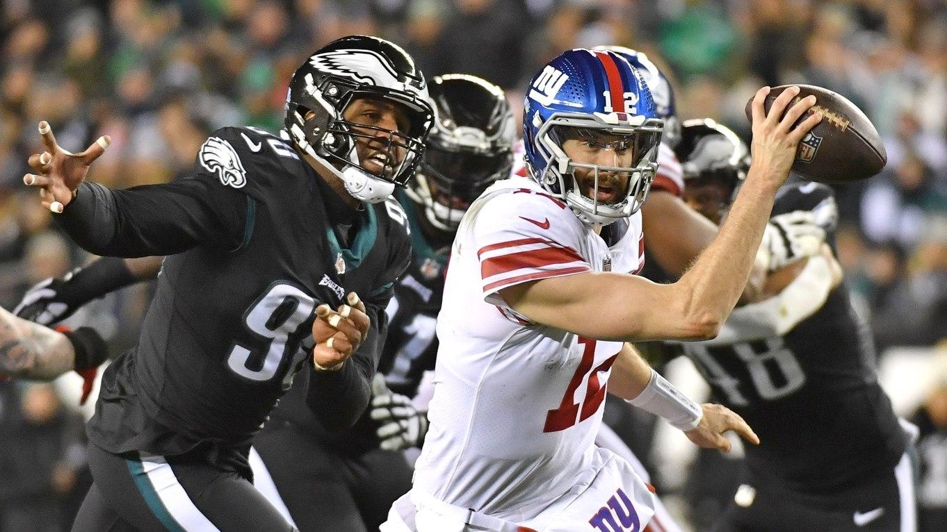 New York Giants quarterback Davis Webb runs away from pressure against the Philadelphia Eagles.