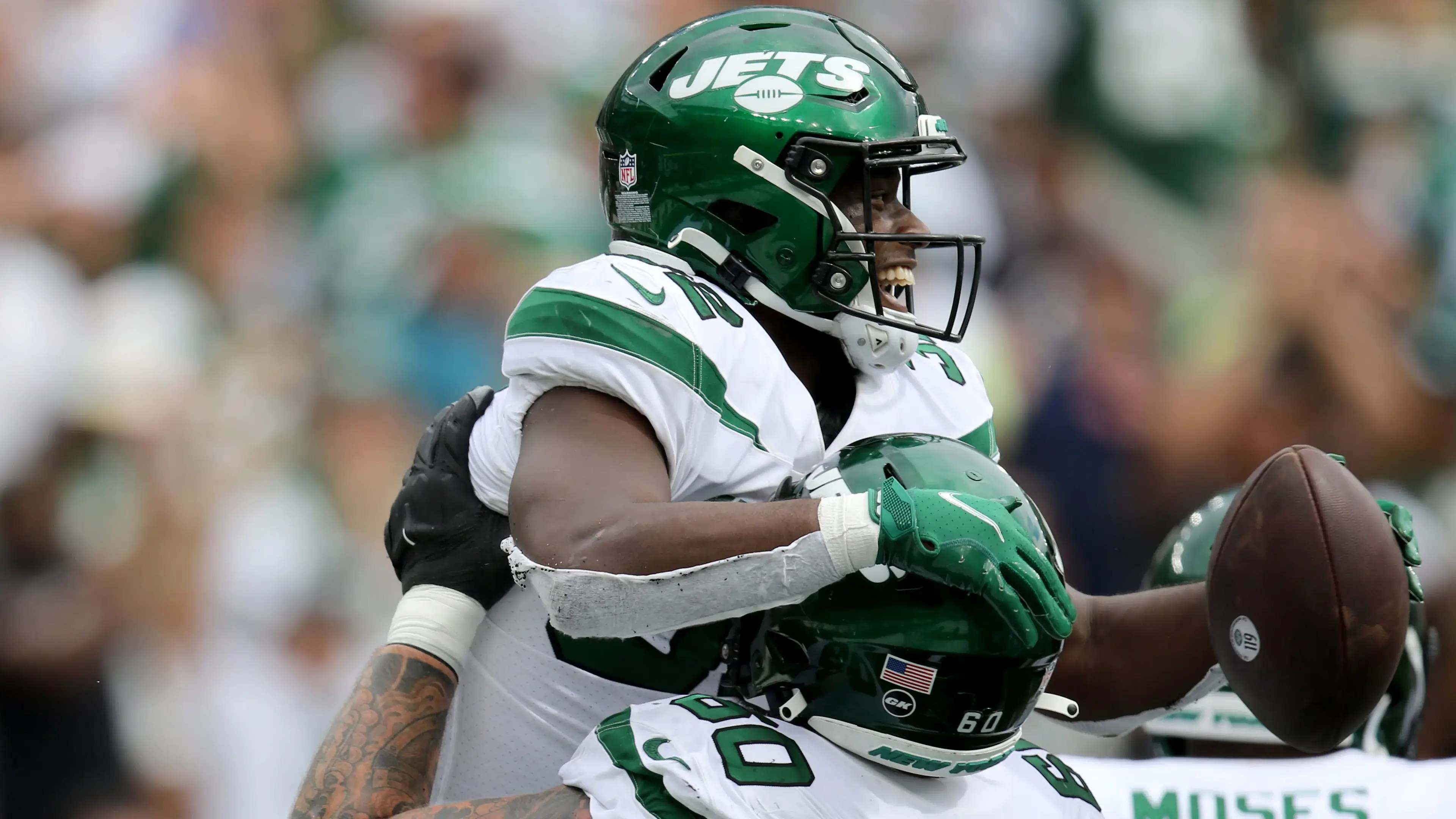 Michael Carter celebrates with New York Jets teammate, Connor McGovern, after a second quarter touchdown. / Kevin R. Wexler-NorthJersey.com-Imagn Content Services, LLC