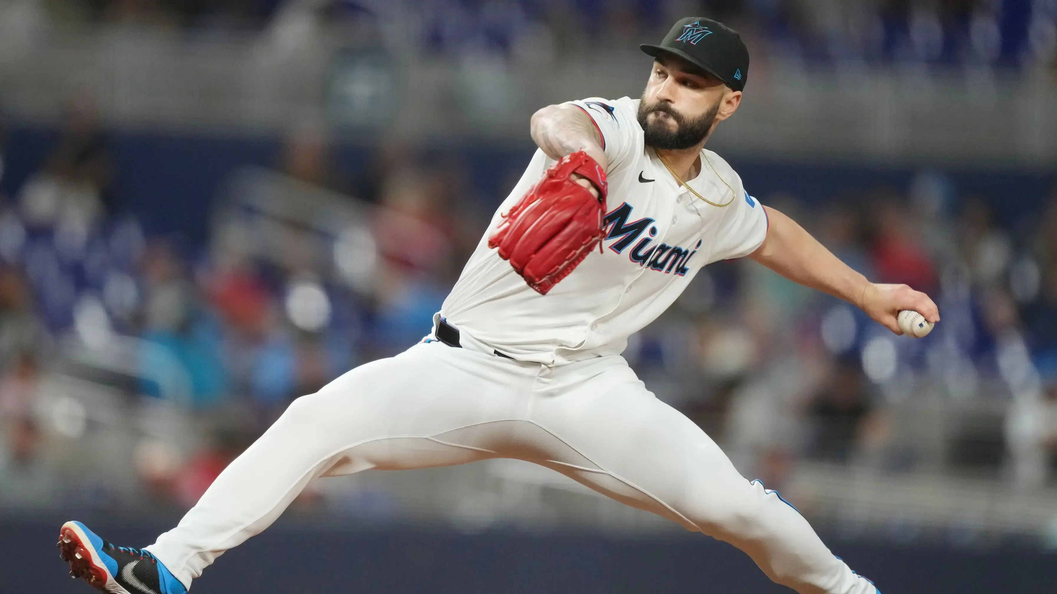 Jul 23, 2024; Miami, Florida, USA; Miami Marlins pitcher Tanner Scott (66) pitches in the ninth inning against the Baltimore Orioles at loanDepot Park.