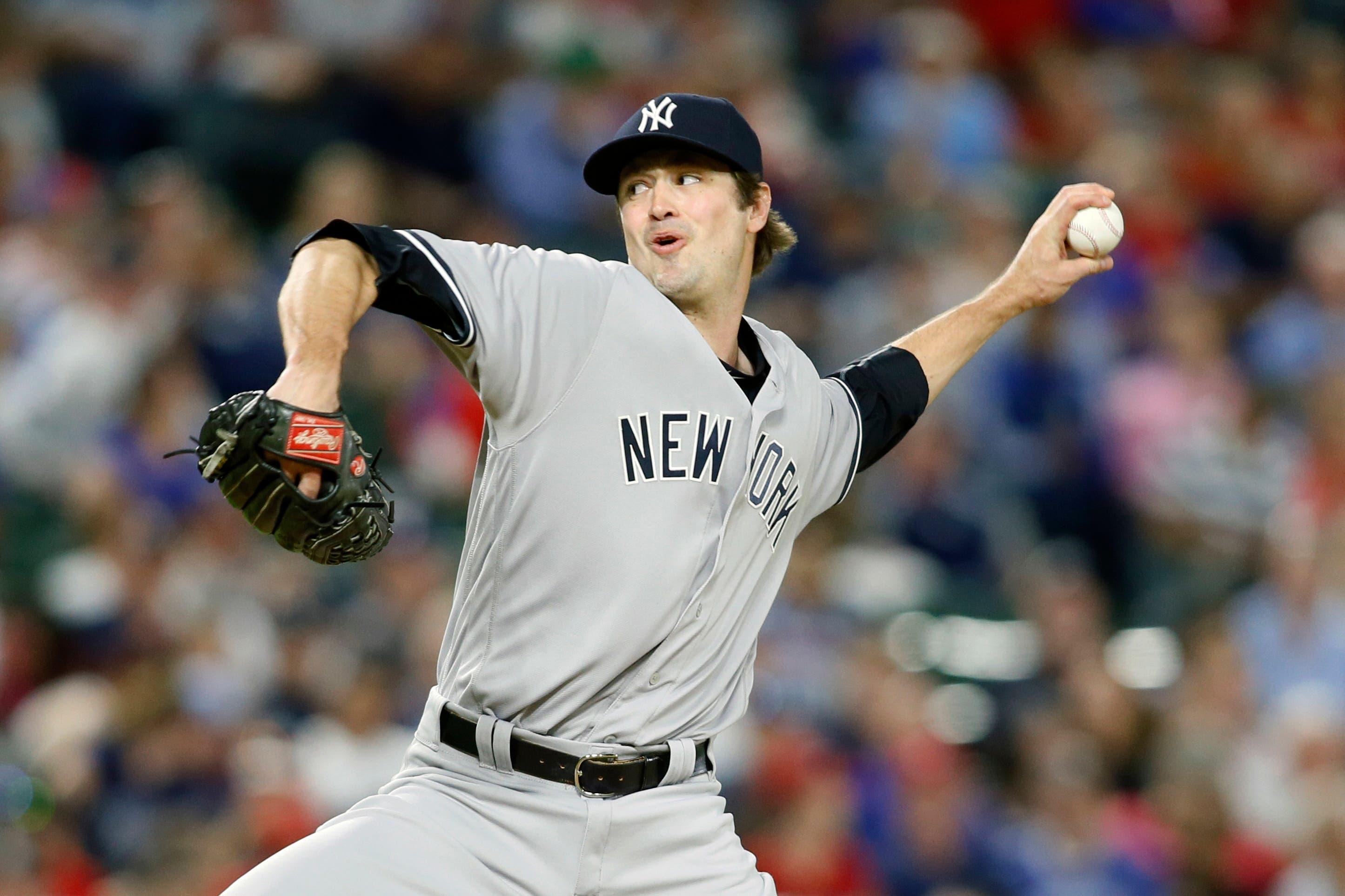 New York Yankees relief pitcher Andrew Miller (48) throws a pitch in the ninth inning against the Texas Rangers at Globe Life Park in Arlington. New York won 3-1. / Tim Heitman