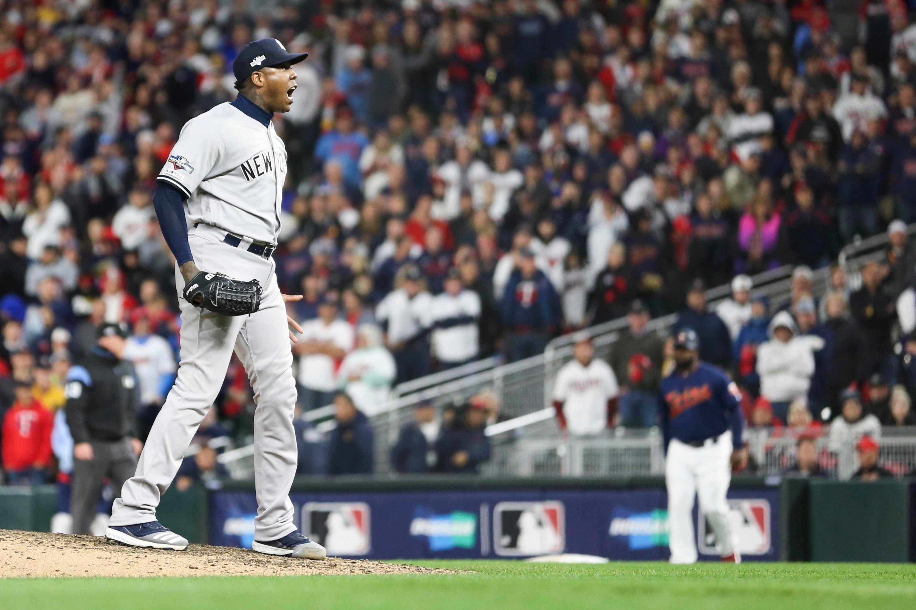 Oct 7, 2019; Minneapolis, MN, USA; New York Yankees relief pitcher Aroldis Chapman (54) reacts to defeating the Minnesota Twins in game three of the 2019 ALDS playoff baseball series at Target Field. Mandatory Credit: Jesse Johnson-USA TODAY Sports / Jesse Johnson