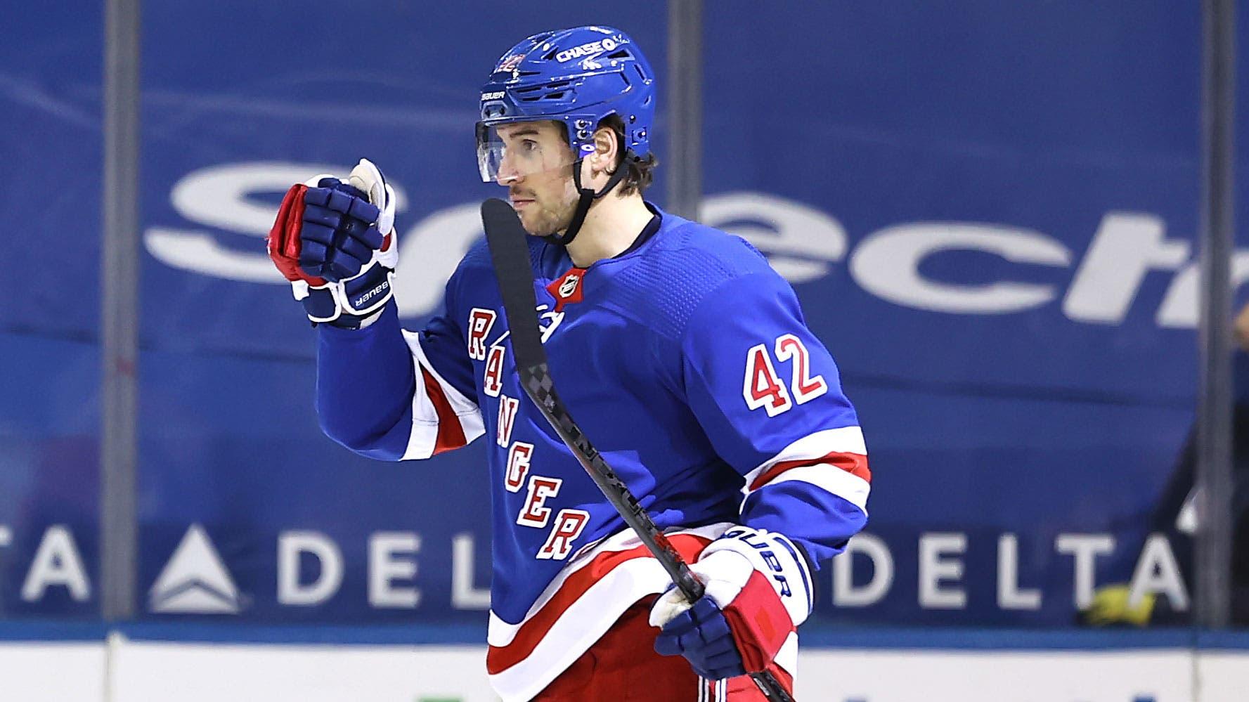 Apr 22, 2021; New York, New York, USA; K'Andre Miller #79 of the New York Rangers congratulates teammate Brendan Smith #42 after Smith scored a goal in the first period against the Philadelphia Flyers at Madison Square Garden. / Elsa/POOL PHOTOS-USA TODAY Sports