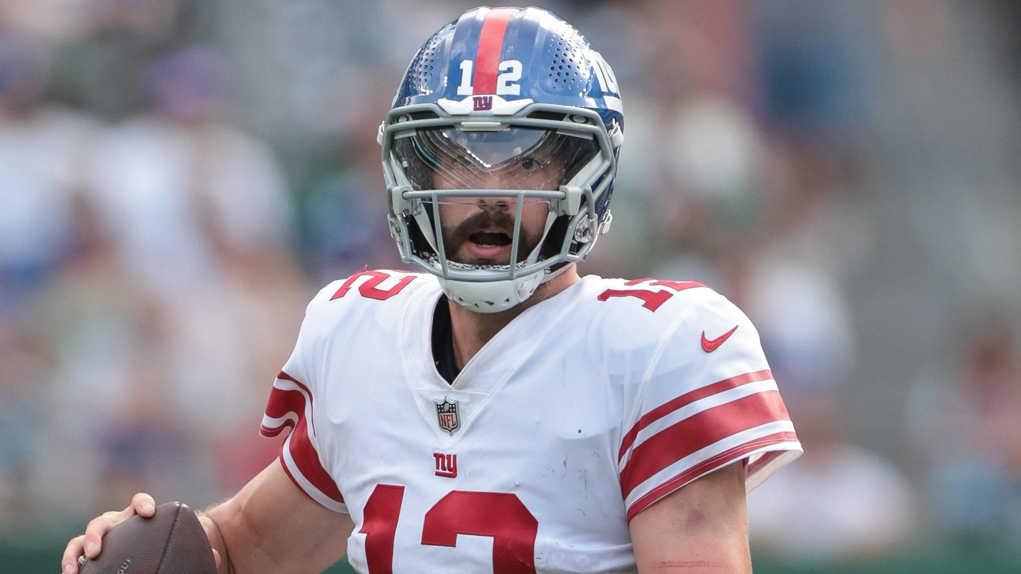 Aug 28, 2022; East Rutherford, New Jersey, USA; New York Giants quarterback Davis Webb (12) drops back to pass during the second half against the New York Giants at MetLife Stadium. Mandatory Credit: Vincent Carchietta-USA TODAY Sports