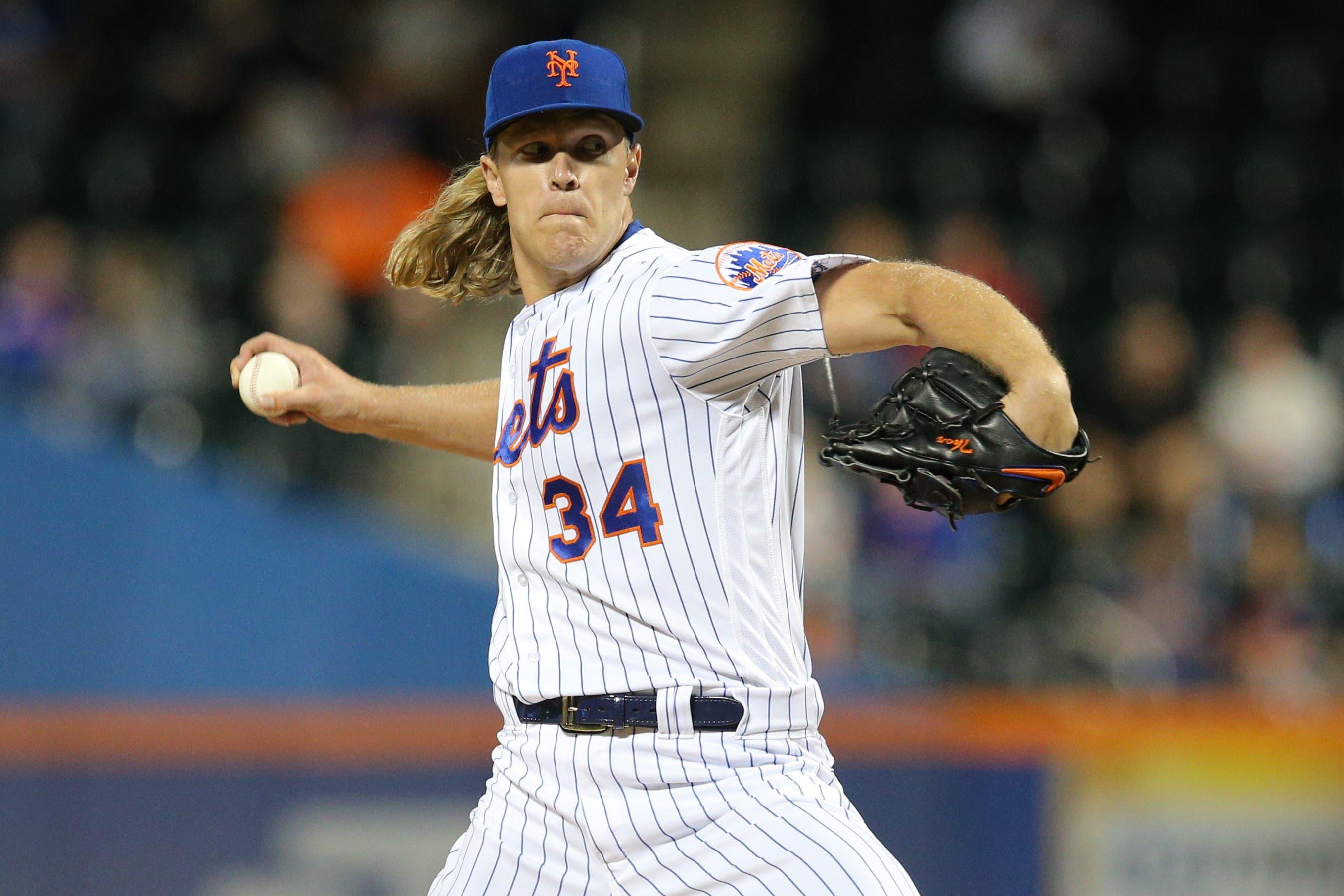 Sep 24, 2019; New York City, NY, USA; New York Mets starting pitcher Noah Syndergaard (34) pitches against the Miami Marlins during the second inning at Citi Field. Mandatory Credit: Brad Penner-USA TODAY Sportsundefined