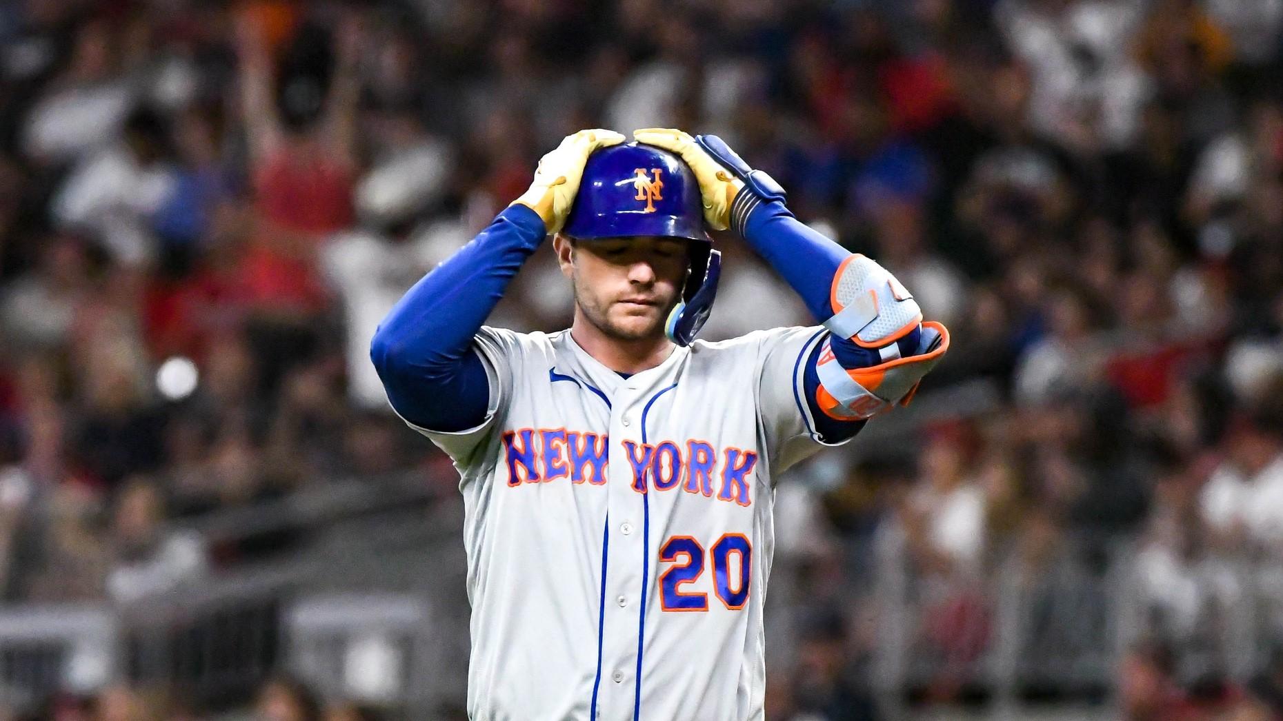 Oct 2, 2022; Cumberland, Georgia, USA; New York Mets first baseman Pete Alonso (20) reacts after hitting a pop fly against the Atlanta Braves in the seventh inning at Truist Park. / Larry Robinson-USA TODAY Sports