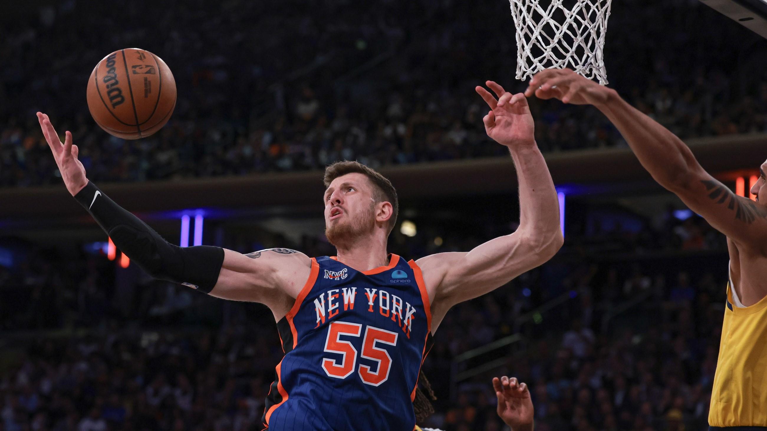 May 14, 2024; New York, New York, USA; New York Knicks center Isaiah Hartenstein (55) rebounds against Indiana Pacers forward Obi Toppin (1) during the second half during game five of the second round for the 2024 NBA playoffs at Madison Square Garden. / Vincent Carchietta-USA TODAY Sports