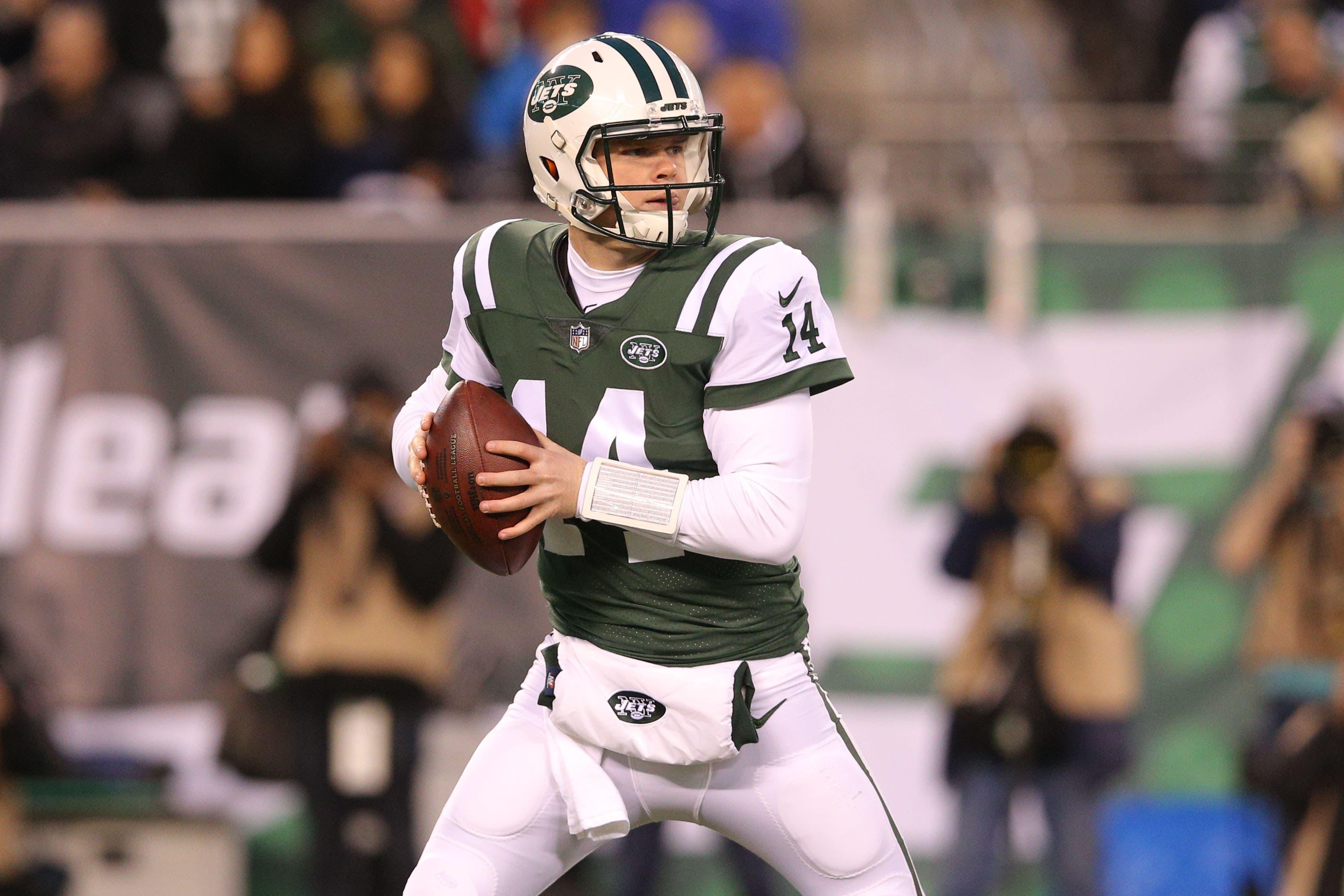 Dec 15, 2018; East Rutherford, NJ, USA; New York Jets quarterback Sam Darnold (14) drops back to pass against the Houston Texans during the first quarter at MetLife Stadium. Mandatory Credit: Brad Penner-USA TODAY Sports / Brad Penner