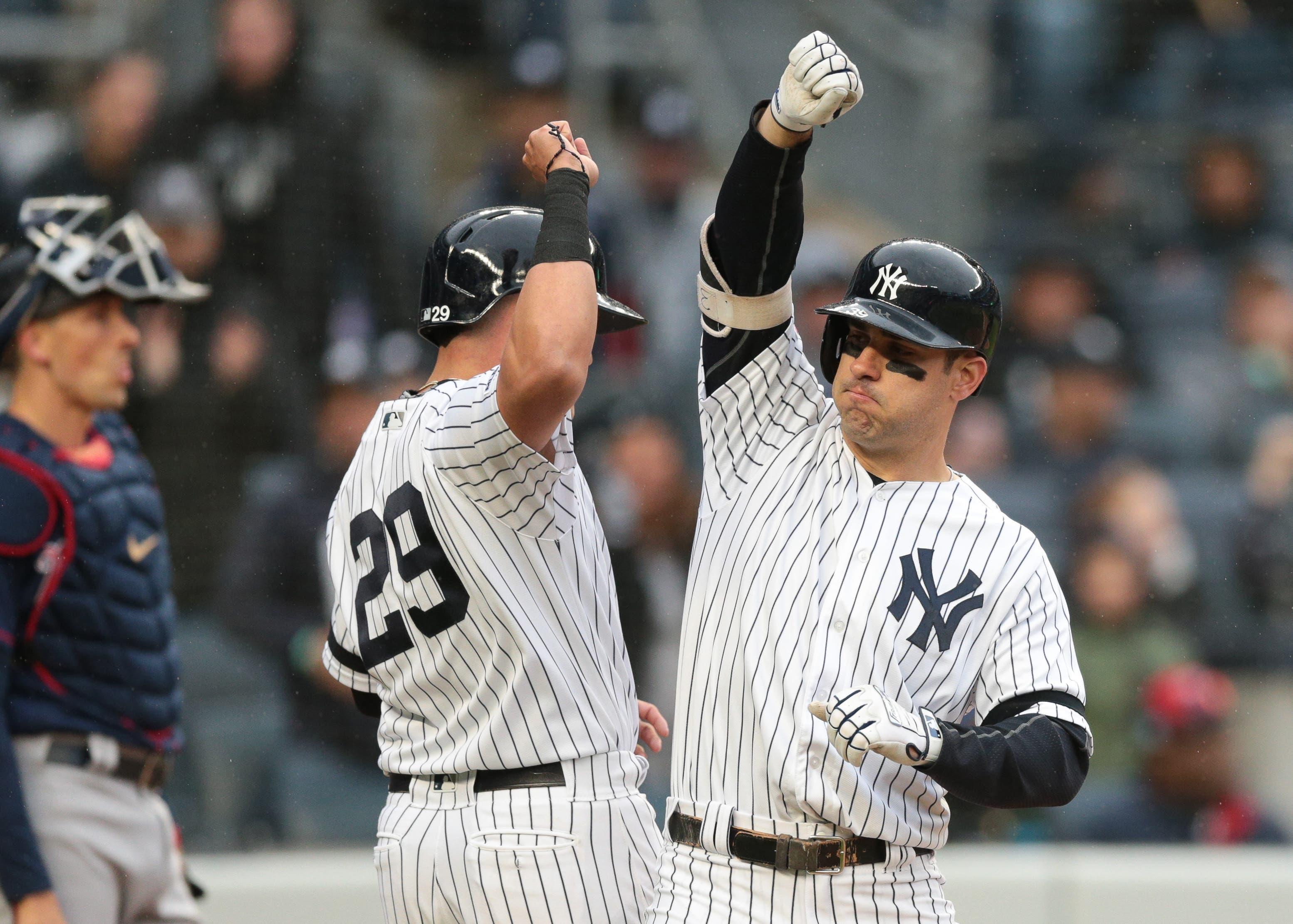 New York Yankees center fielder Mike Tauchman celebrates with third baseman Gio Urshela after hitting a two-run home run during the fourth inning against the Minnesota Twins at Yankee Stadium. / Vincent Carchietta/USA TODAY Sports