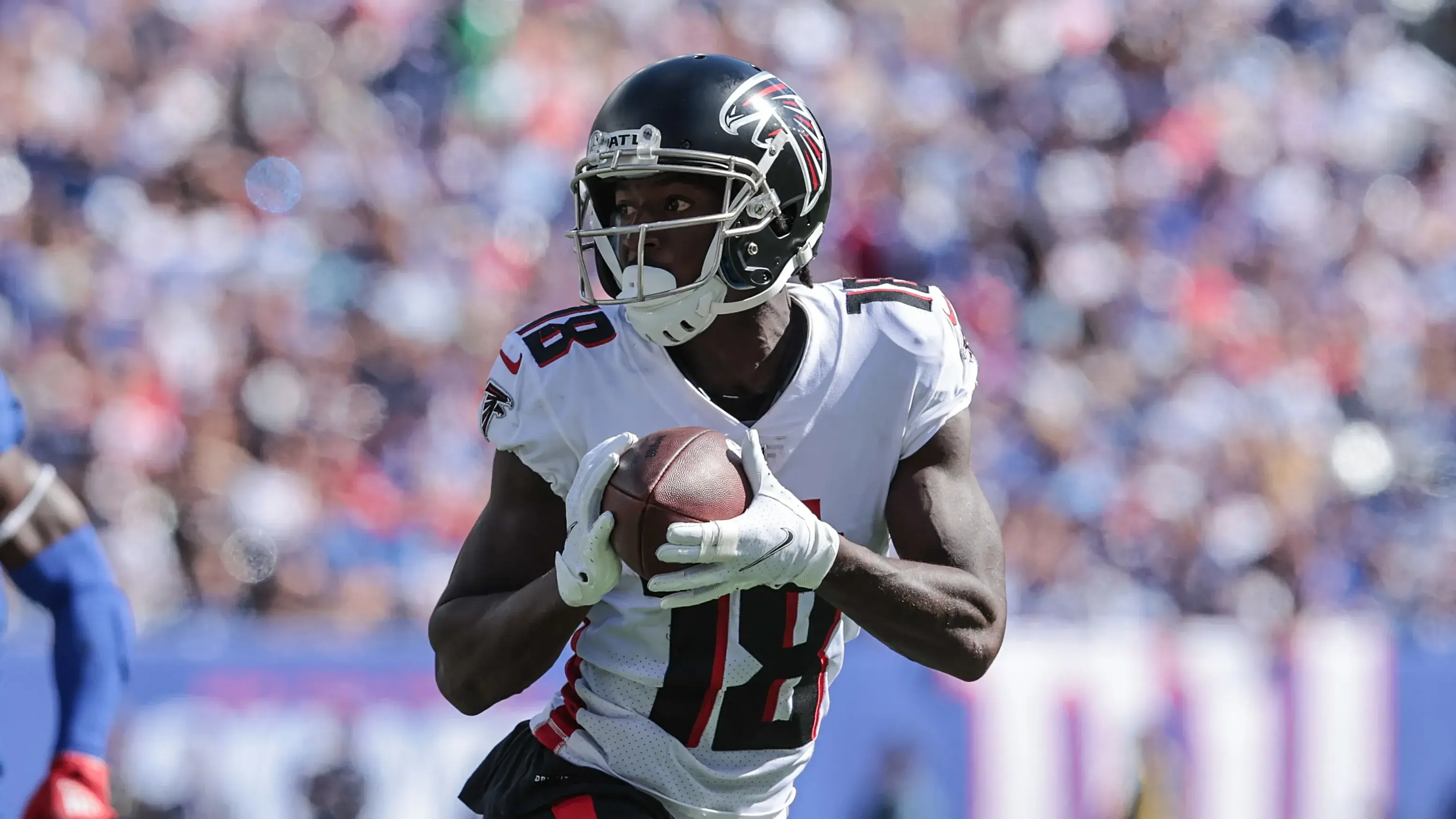 Sep 26, 2021; East Rutherford, New Jersey, USA; Atlanta Falcons wide receiver Calvin Ridley (18) carries the ball past New York Giants free safety Jabrill Peppers (21) during the first quarter at MetLife Stadium. Mandatory Credit: Vincent Carchietta-USA TODAY Sports / © Vincent Carchietta-USA TODAY Sports