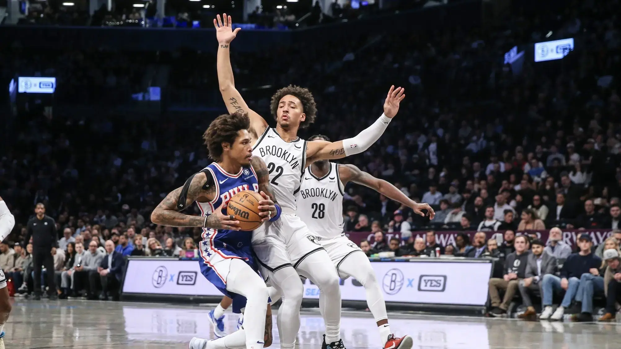 Mar 5, 2024; Brooklyn, New York, USA; Philadelphia 76ers guard Kelly Oubre Jr. (9) drives past Brooklyn Nets forward Jalen Wilson (22) in the first quarter at Barclays Center. / Wendell Cruz-USA TODAY Sports