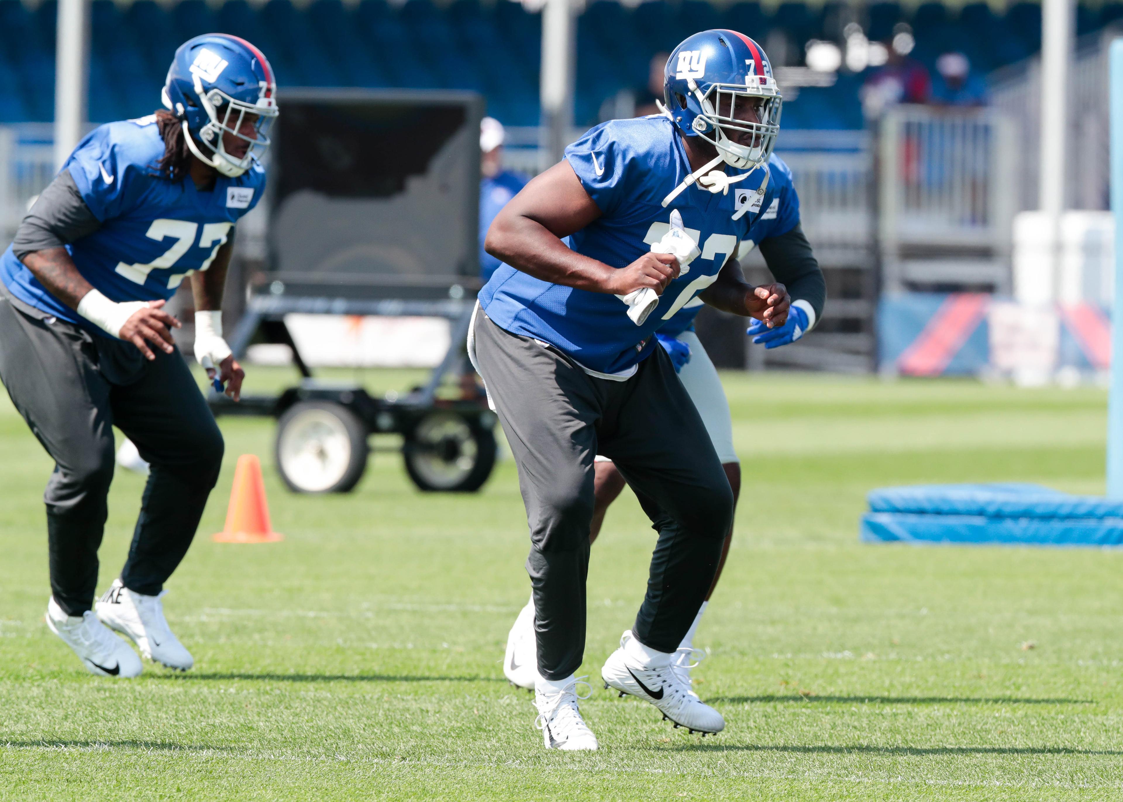 Jul 25, 2019; East Rutherford, NJ, USA; New York Giants defensive tackle Olsen Pierre (72) participates in drills during the first day of training camp at Quest Diagnostics Training Center. Mandatory Credit: Vincent Carchietta-USA TODAY Sports / Vincent Carchietta