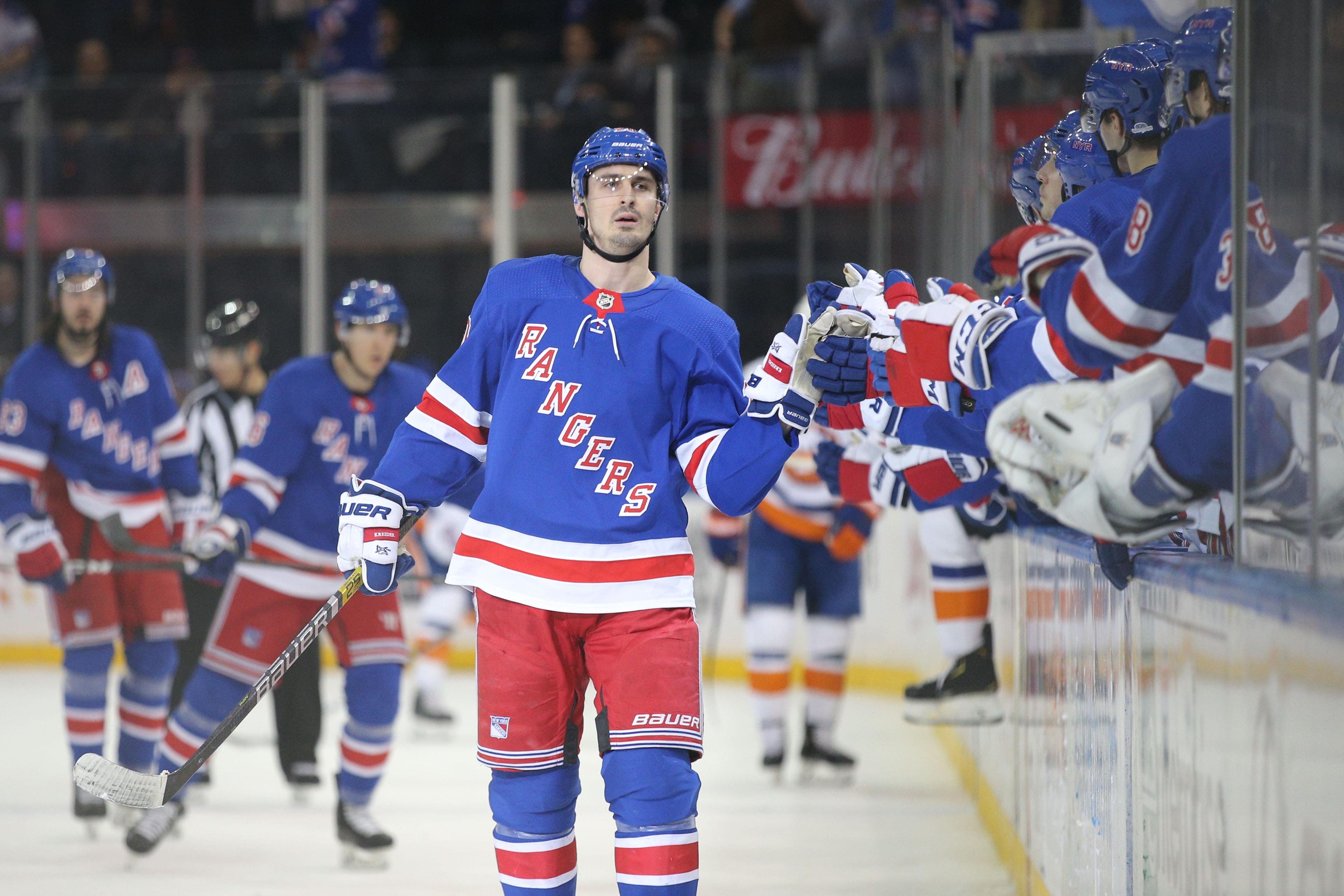 Jan 21, 2020; New York, New York, USA; New York Rangers left wing Chris Kreider (20) celebrates his goal against the New York Islanders during the third period at Madison Square Garden. Mandatory Credit: Brad Penner-USA TODAY Sports / Brad Penner