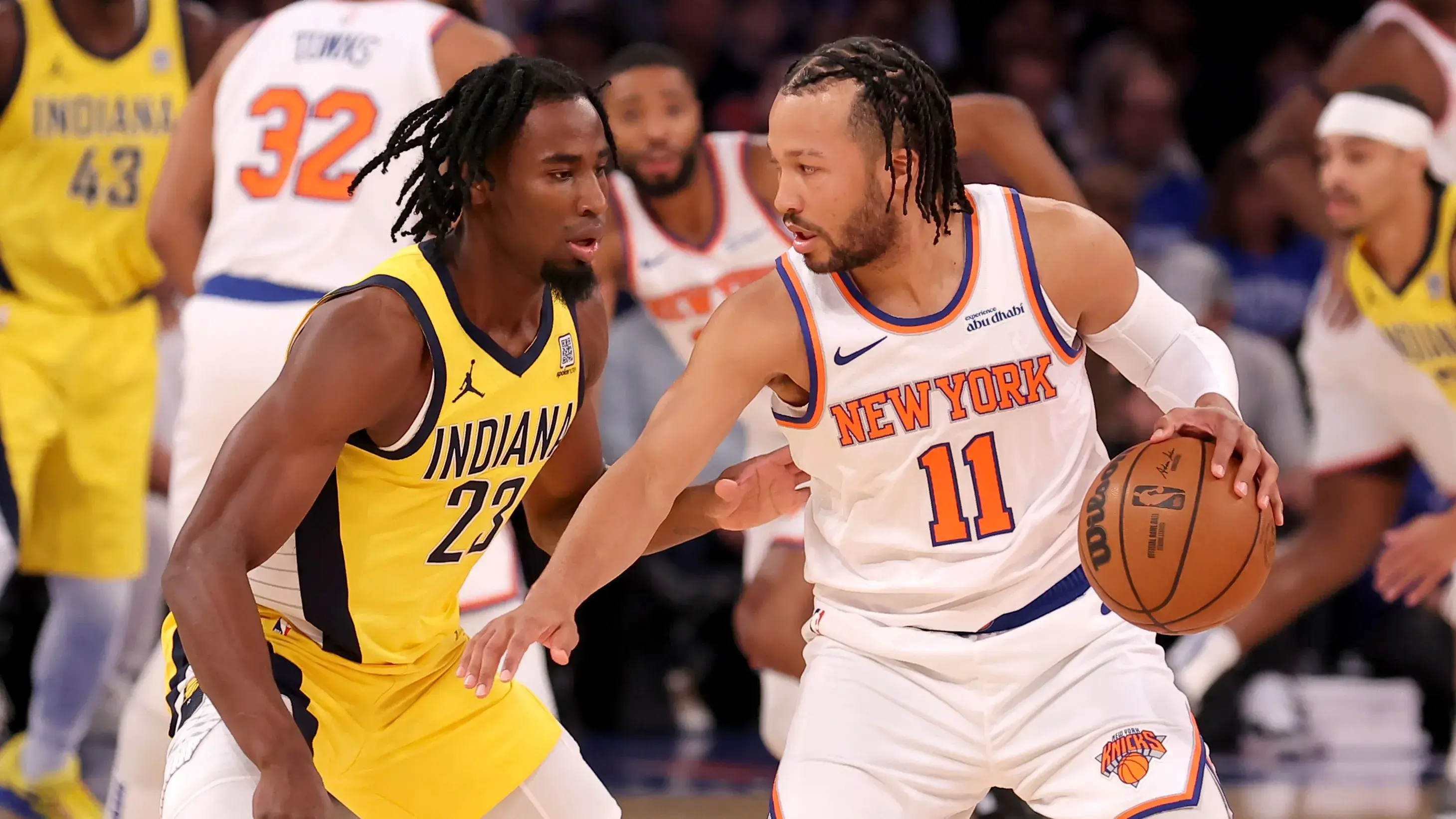 Oct 25, 2024; New York, New York, USA; New York Knicks guard Jalen Brunson (11) controls the ball against Indiana Pacers forward Aaron Nesmith (23) during the first quarter at Madison Square Garden. Mandatory Credit: Brad Penner-Imagn Images / © Brad Penner-Imagn Images