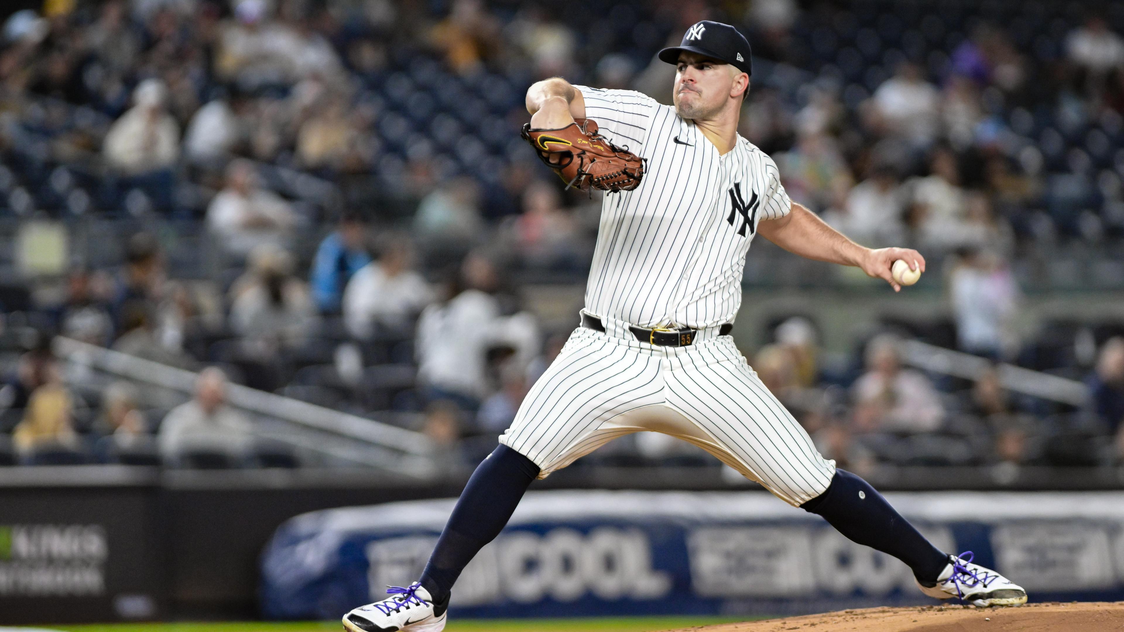 New York Yankees pitcher Carlos Rodon (55) pitches against the Pittsburgh Pirates during the first inning at Yankee Stadium. / John Jones-Imagn Images