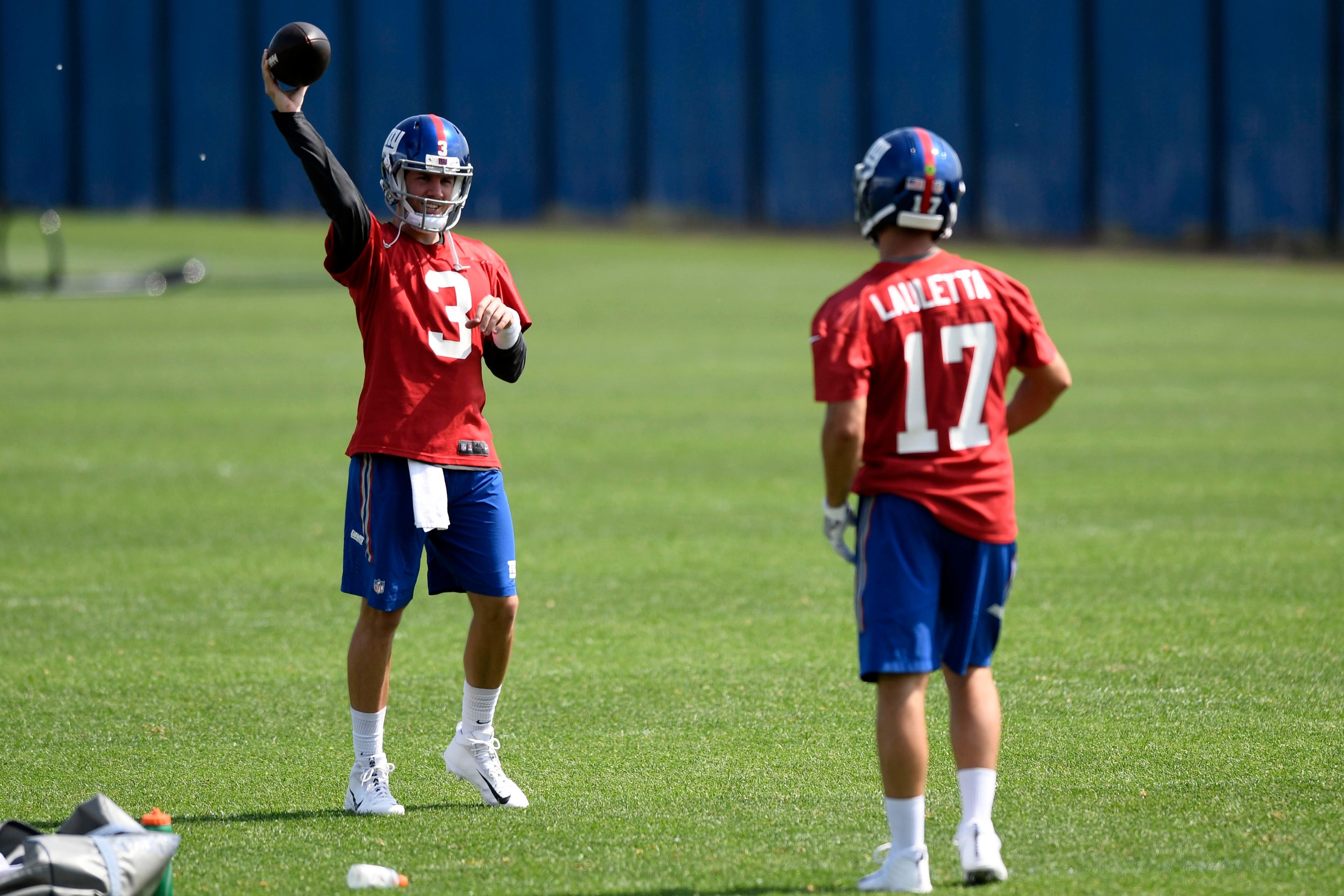 May 29, 2018; East Rutherford, NJ, USA; New York Giants quarterbacks Alex Tanney (3) and Kyle Lauletta (17) throw the ball back and forth during Organized Team Activities. Mandatory Credit: Danielle Parhizkaran/Northjersey.com via USA TODAY NETWORK