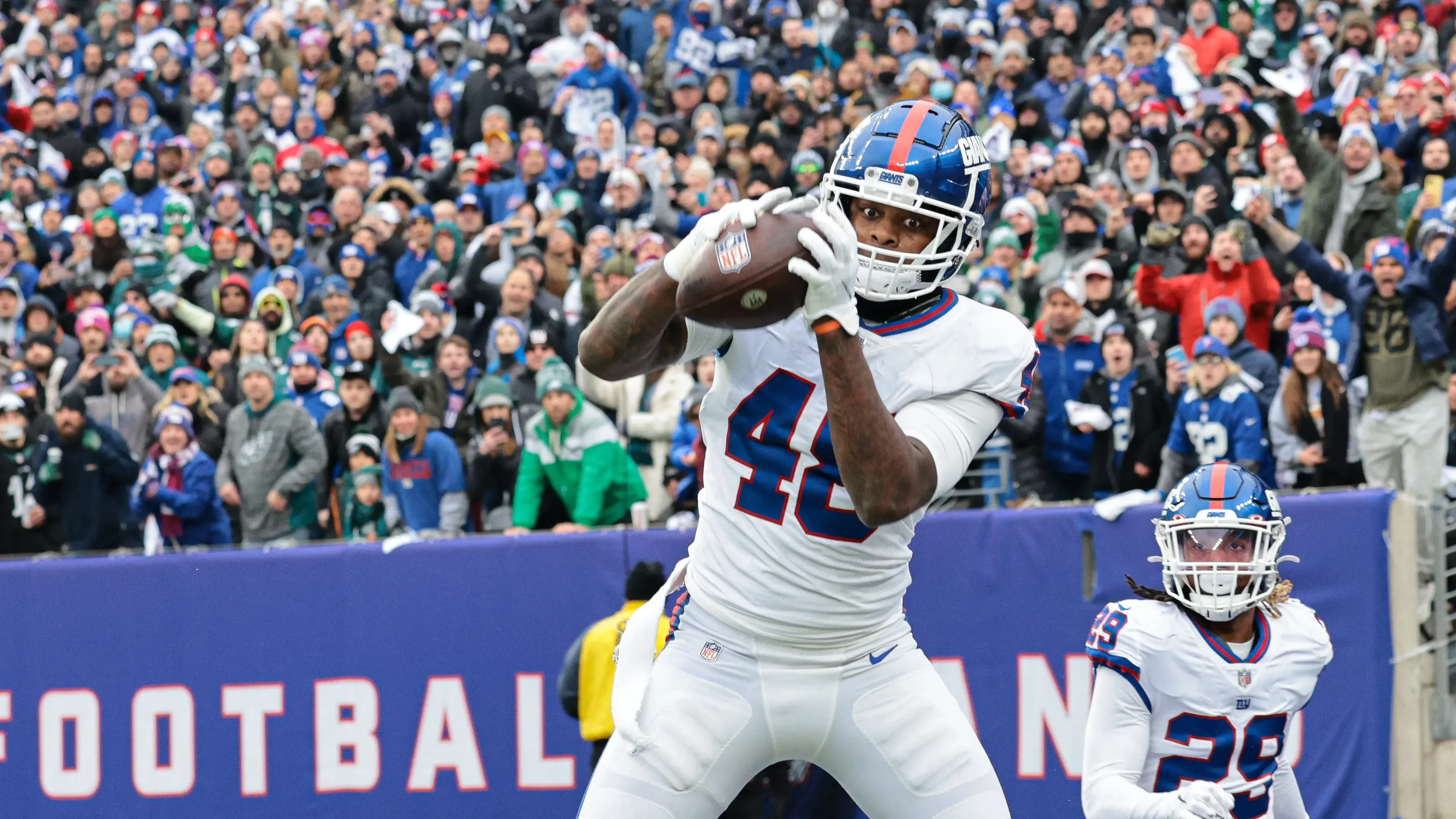 Nov 28, 2021; East Rutherford, New Jersey, USA; New York Giants inside linebacker Tae Crowder (48) intercepts a pass in front of free safety Xavier McKinney (29) during the first half against the Philadelphia Eagles at MetLife Stadium. Mandatory Credit: Vincent Carchietta-USA TODAY Sports / Vincent Carchietta-USA TODAY Sports