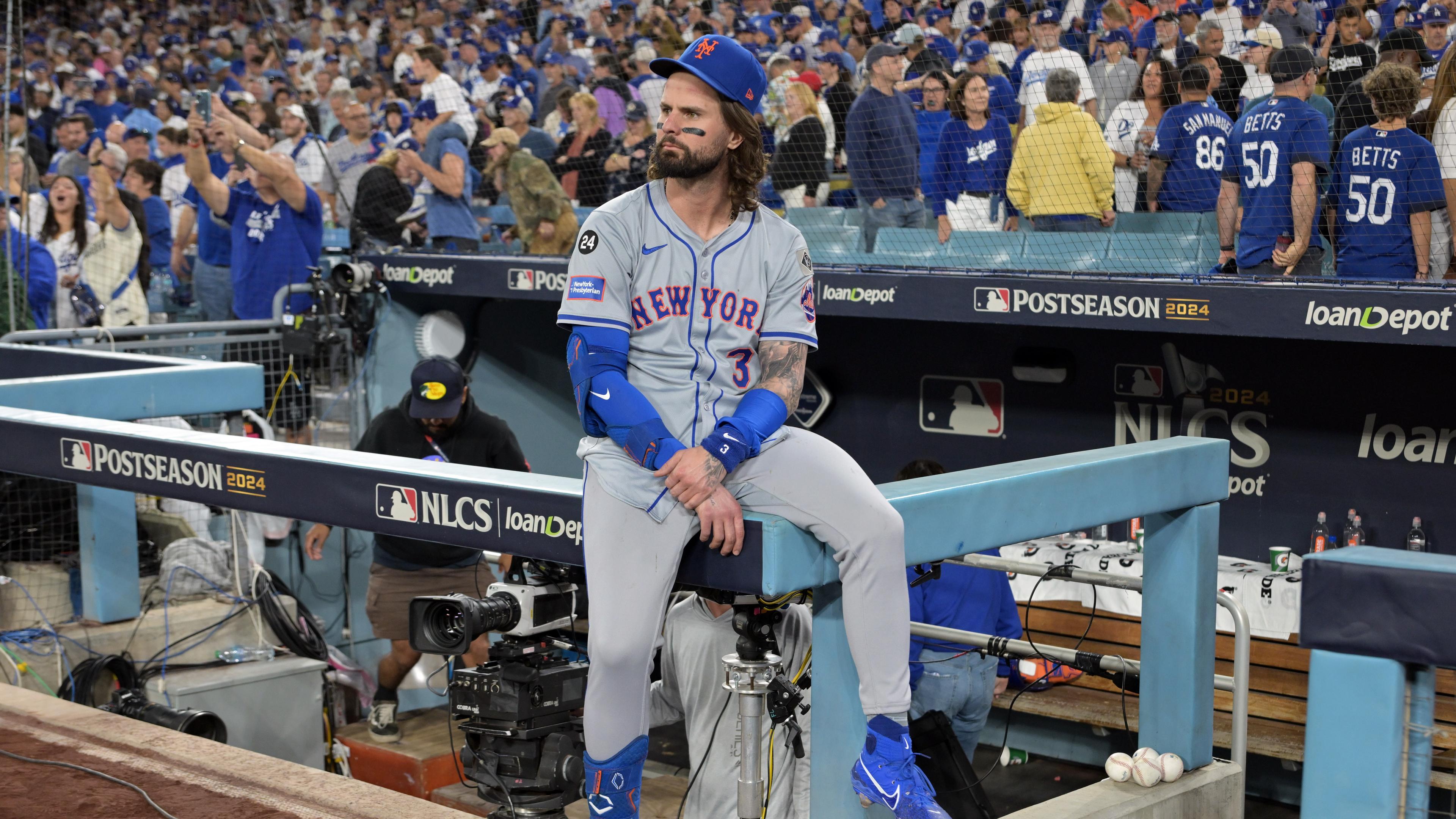 Oct 20, 2024; Los Angeles, California, USA; New York Mets outfielder Jesse Winker (3) reacts after the loss against the Los Angeles Dodgers in game six of the NLCS for the 2024 MLB playoffs to advance to the World Series at Dodger Stadium. 