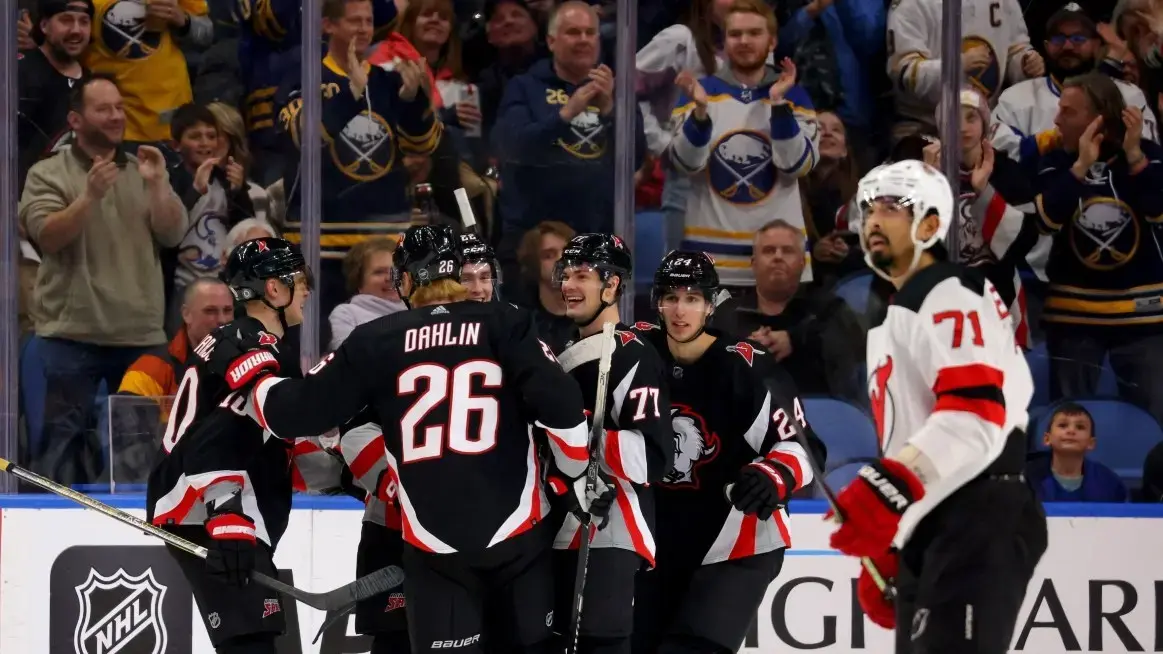 Buffalo Sabres center Dylan Cozens celebrates his goal with teammates during the first period against the New Jersey Devils. / Timothy T. Ludwig-USA TODAY Sports
