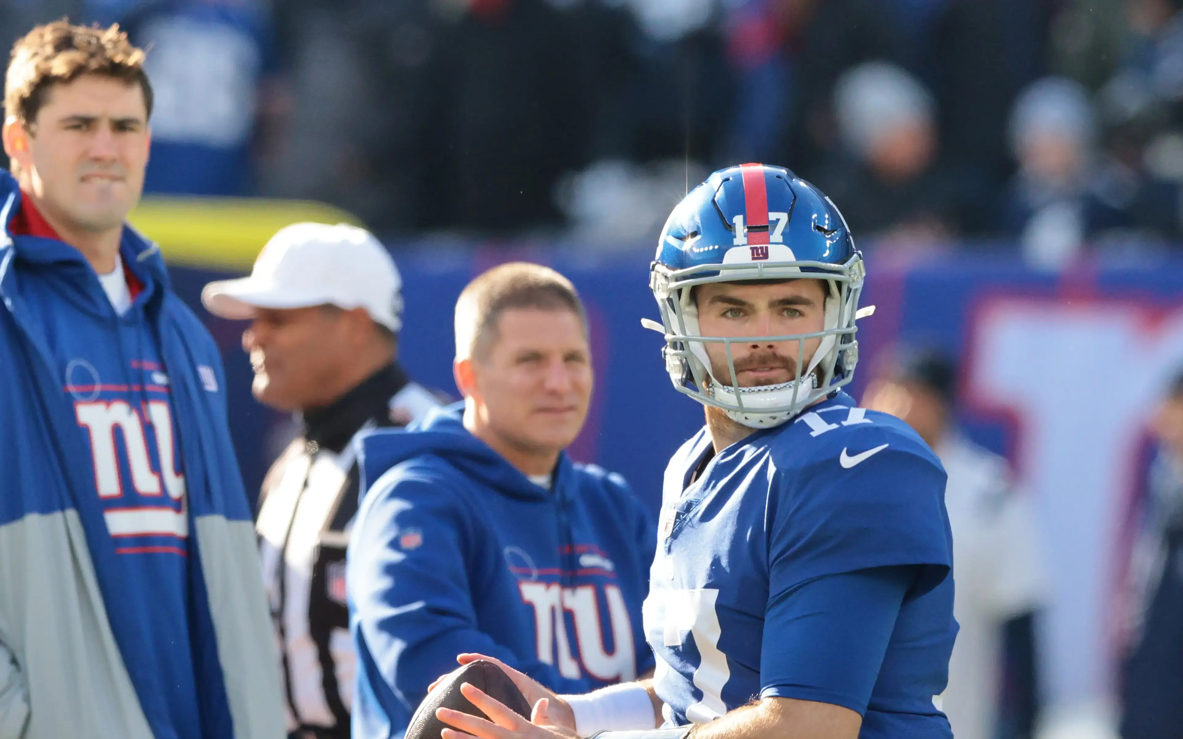 Dec 19, 2021; East Rutherford, New Jersey, USA; New York Giants quarterback Jake Fromm (17) throws the ball as quarterback Daniel Jones (8) looks on before the game against the Dallas Cowboys at MetLife Stadium. Mandatory Credit: Vincent Carchietta-USA TODAY Sports / © Vincent Carchietta-USA TODAY Sports