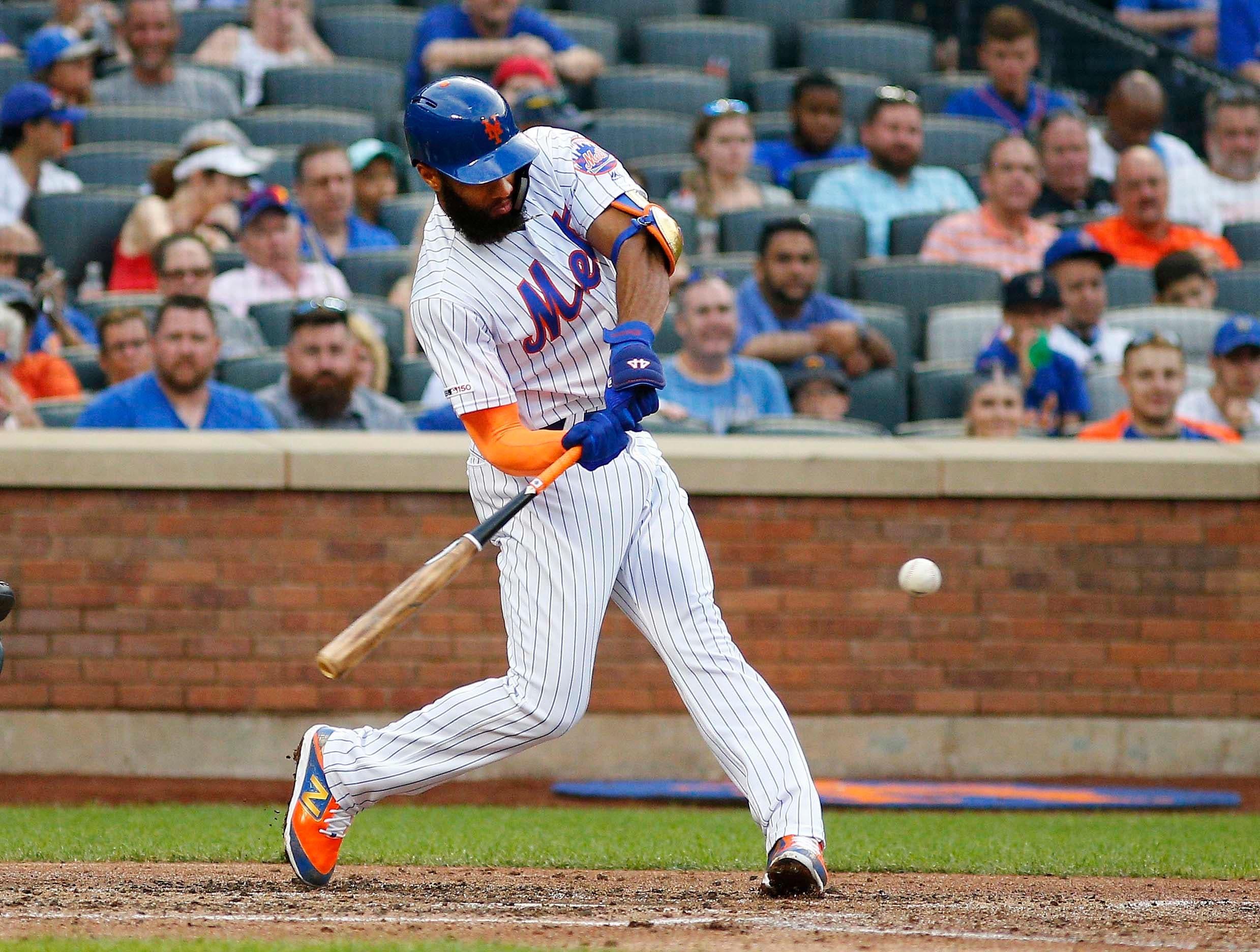 Jun 29, 2019; New York City, NY, USA; New York Mets shortstop Amed Rosario (1) doubles against the Atlanta Braves during the fourth inning at Citi Field. Mandatory Credit: Andy Marlin-USA TODAY Sports / Andy Marlin