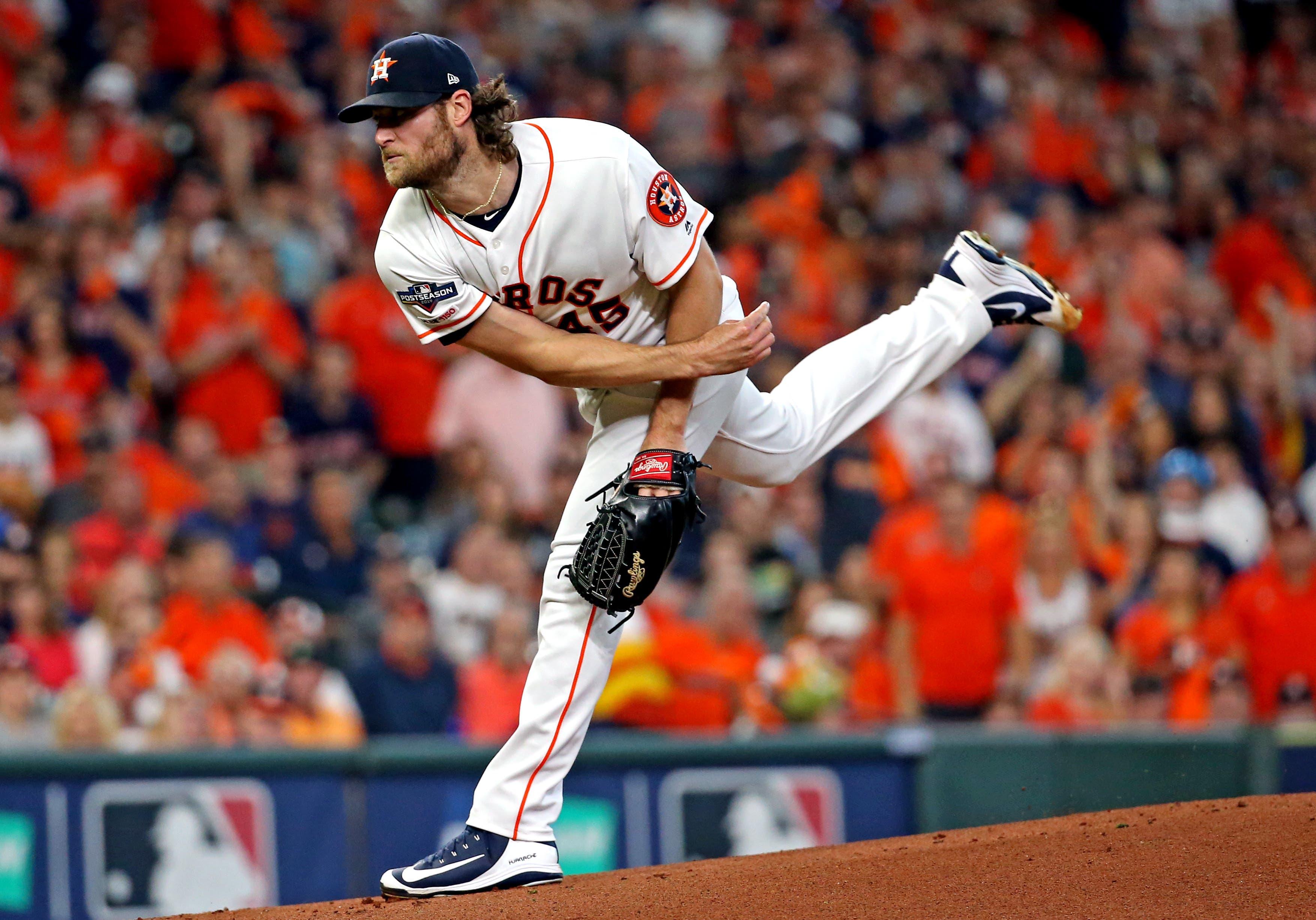 Oct 10, 2019; Houston, TX, USA; Houston Astros starting pitcher Gerrit Cole (45) pitches during the first inning against the Tampa Bay Rays in game five of the 2019 ALDS playoff baseball series at Minute Maid Park. Mandatory Credit: Troy Taormina-USA TODAY Sports / Troy Taormina