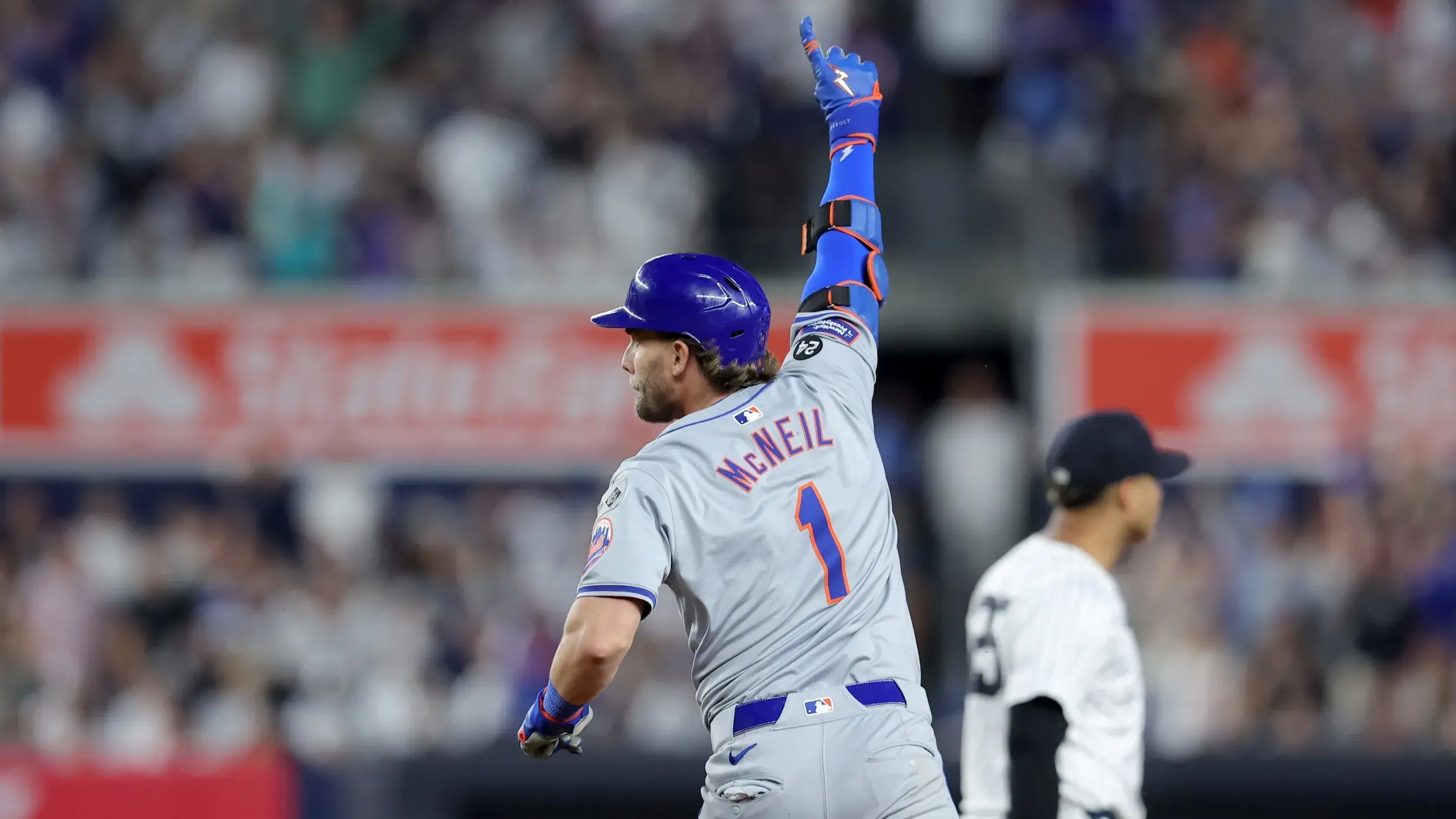 Jul 23, 2024; Bronx, New York, USA; New York Mets second baseman Jeff McNeil (1) celebrates as he rounds the bases after hitting a two run home run against the New York Yankees during the sixth inning at Yankee Stadium. / Brad Penner-USA TODAY Sports