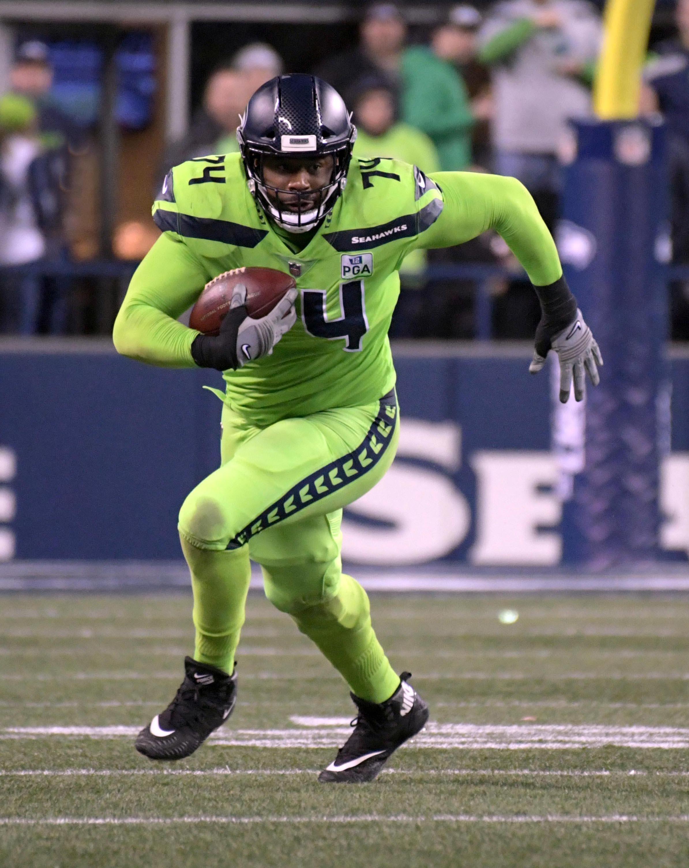 Dec 10, 2018; Seattle, WA, USA; Seattle Seahawks offensive tackle George Fant (74) carries the ball on a pass reception in the third quarter against the Minnesota Vikings at CenturyLink Field. The Seahawks defeated the Vikings 21-7. Mandatory Credit: Kirby Lee-USA TODAY Sports