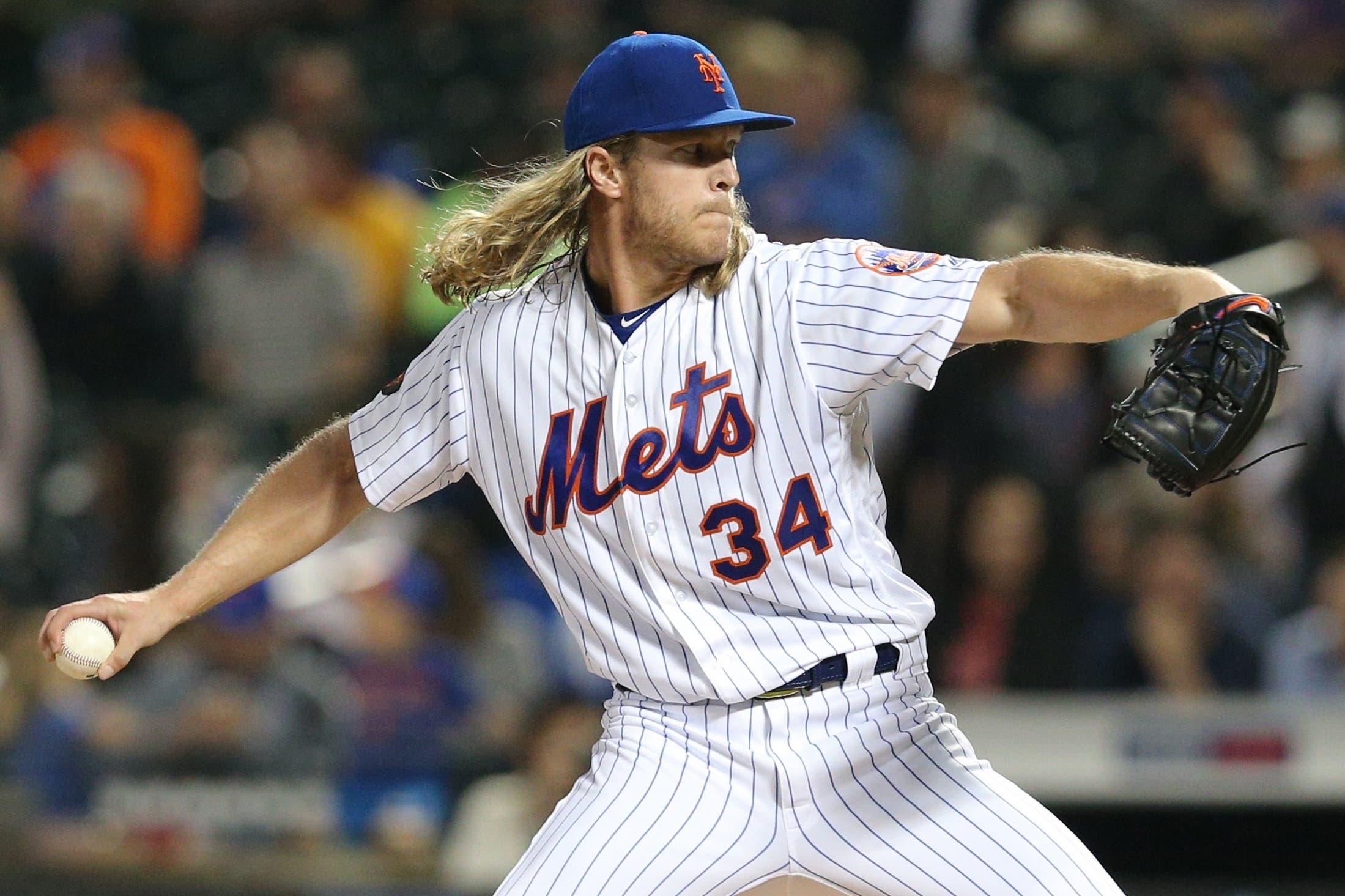 May 15, 2018; New York City, NY, USA; New York Mets starting pitcher Noah Syndergaard (34) pitches against the Toronto Blue Jays during the second inning at Citi Field. Mandatory Credit: Brad Penner-USA TODAY Sports / Brad Penner