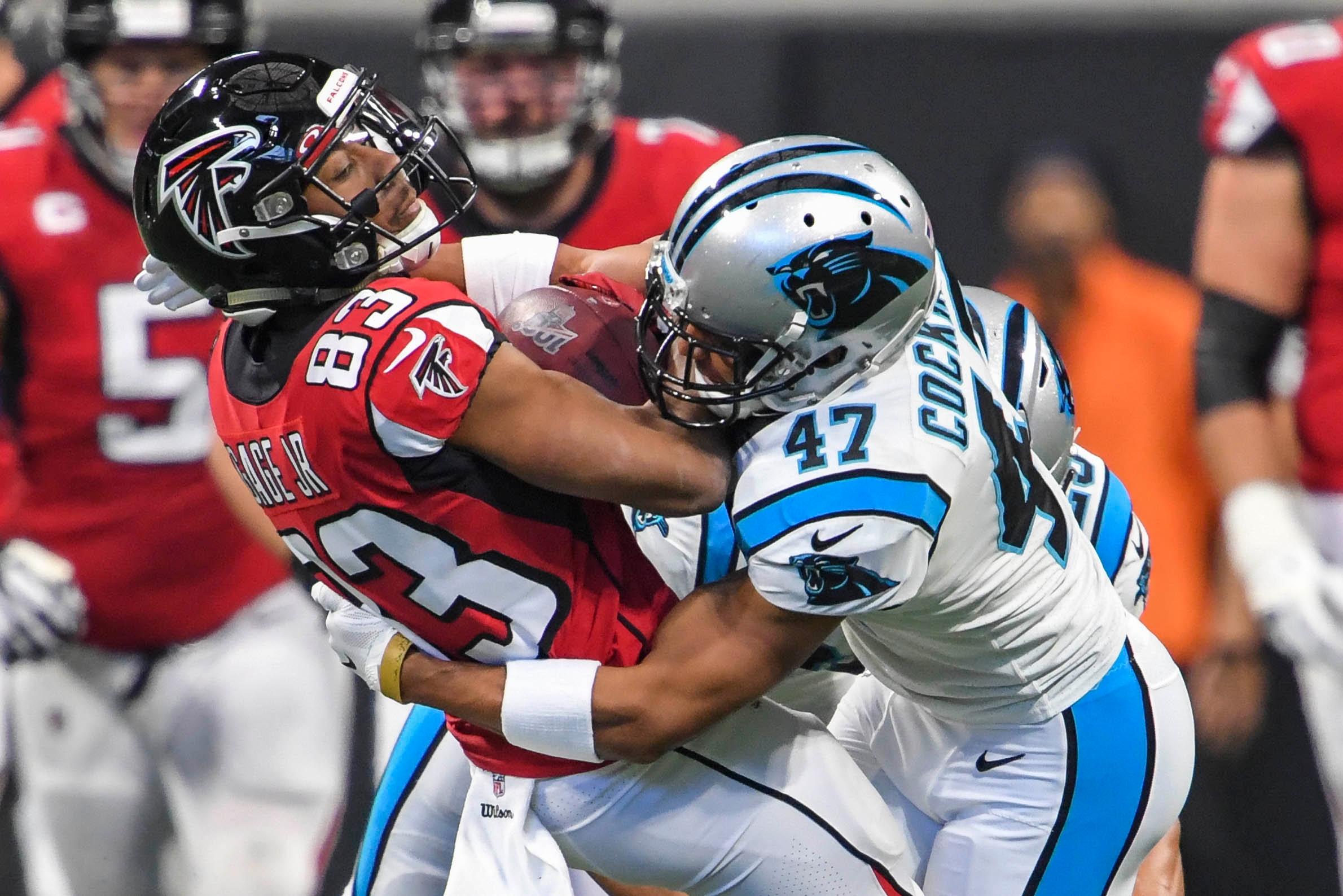 Dec 8, 2019; Atlanta, GA, USA; Atlanta Falcons wide receiver Russell Gage (83) is tackled by Carolina Panthers defensive back Ross Cockrell (47) during the first half at Mercedes-Benz Stadium. / Dale Zanine-USA TODAY Sports