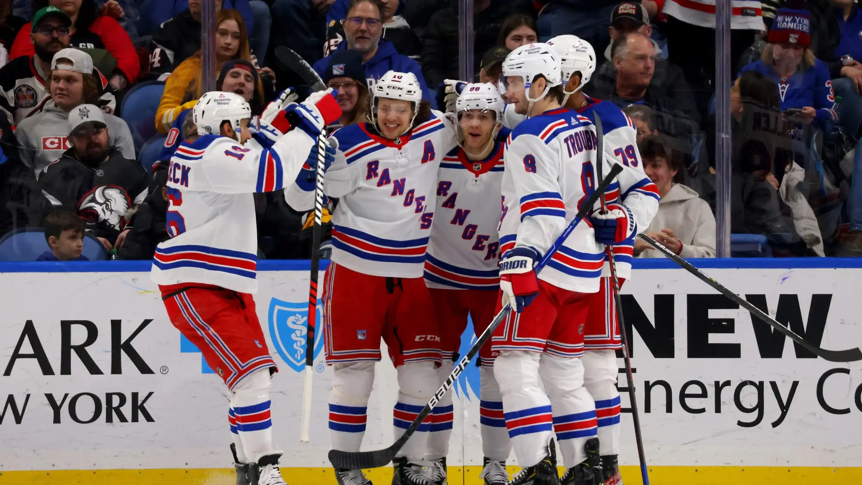 Mar 11, 2023; Buffalo, New York, USA; New York Rangers right wing Patrick Kane (88) celebrates his goal with teammates during the second period against the Buffalo Sabres at KeyBank Center. / Timothy T. Ludwig-USA TODAY Sports