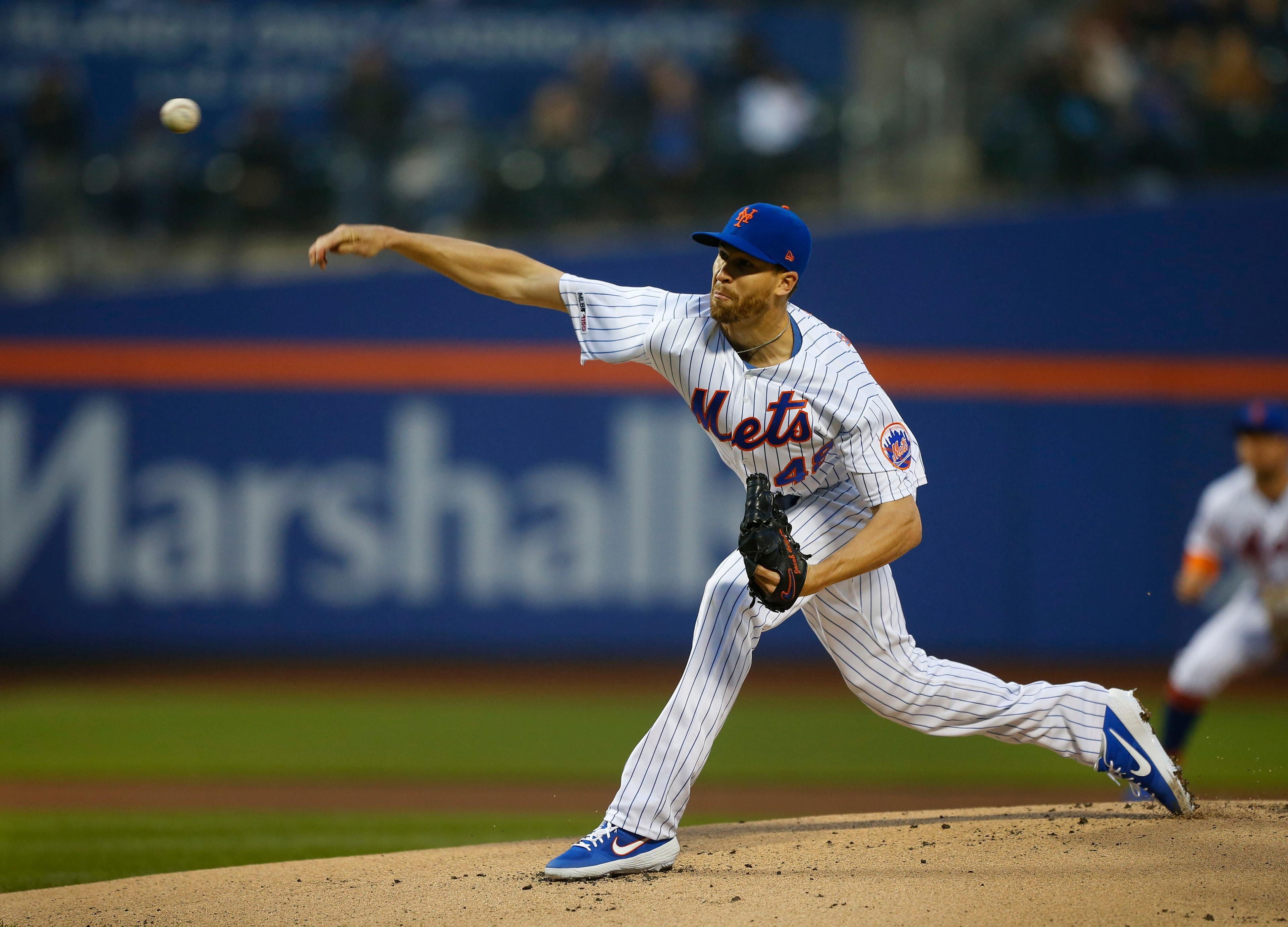 New York Mets starting pitcher Jacob deGrom throws the ball against the Cincinnati Reds in the first inning at Citi Field. / Noah K. Murray/USA TODAY Sports