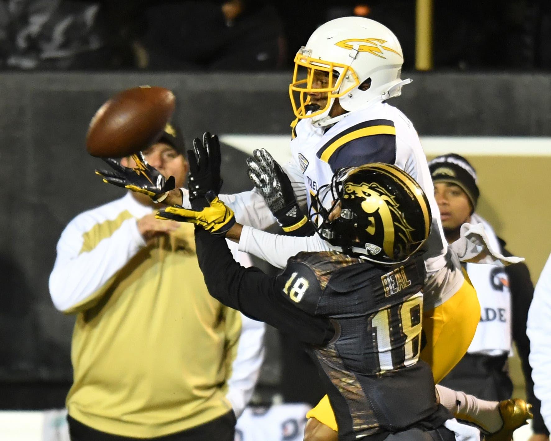 Nov 25, 2016; Kalamazoo, MI, USA; Pass interference is called against Western Michigan Broncos defensive back Sam Beal (18) defending a pass intended for Toledo Rockets wide receiver Jon'Vea Johnson (7) during the first half at Waldo Stadium. Mandatory Credit: Patrick Gorski-USA TODAY Sports / Patrick Gorski