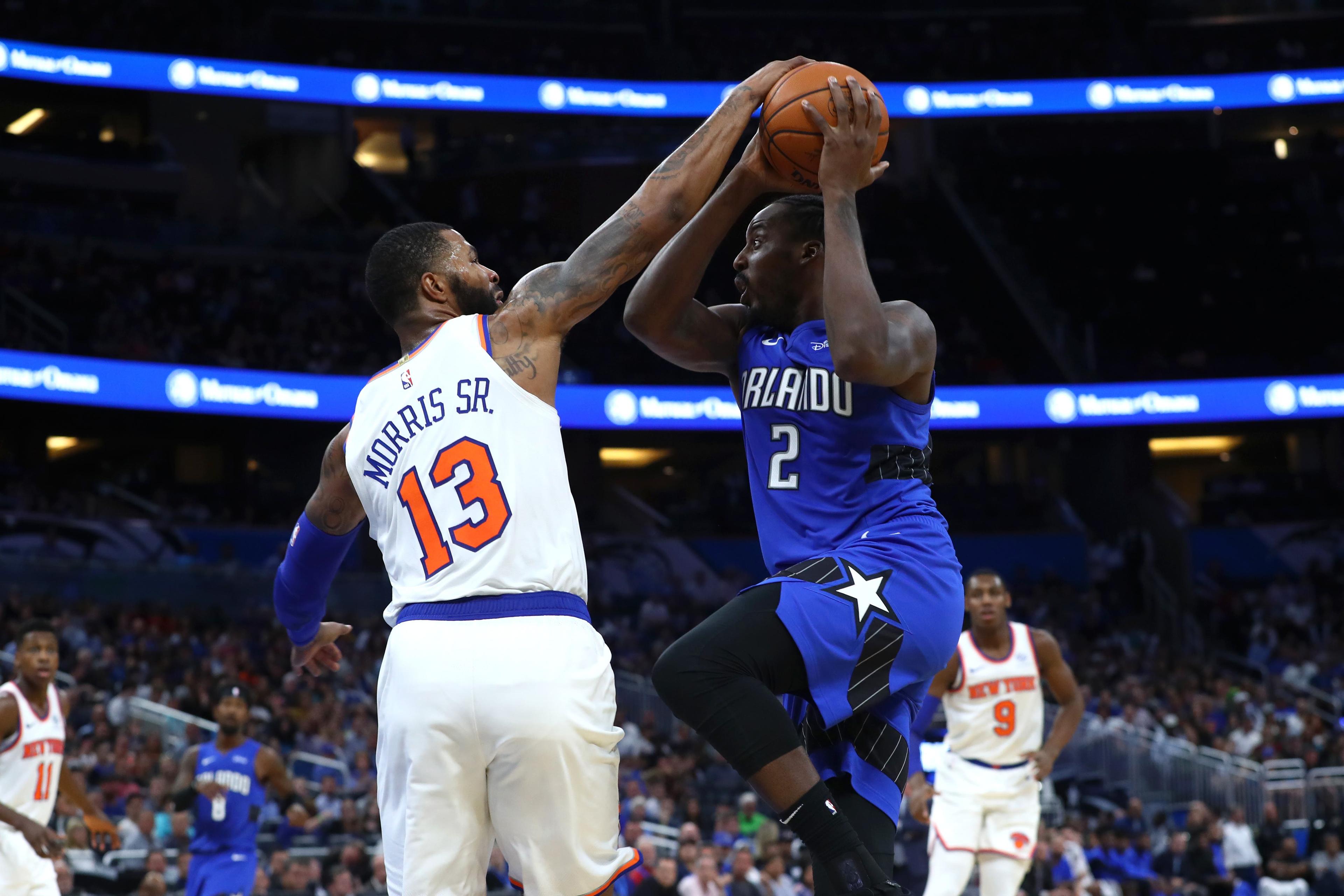 Oct 30, 2019; Orlando, FL, USA; Orlando Magic forward Al-Farouq Aminu (2) drives to the basket against New York Knicks forward Marcus Morris Sr. (13) at Amway Center. Mandatory Credit: Kim Klement-USA TODAY Sports / Kim Klement