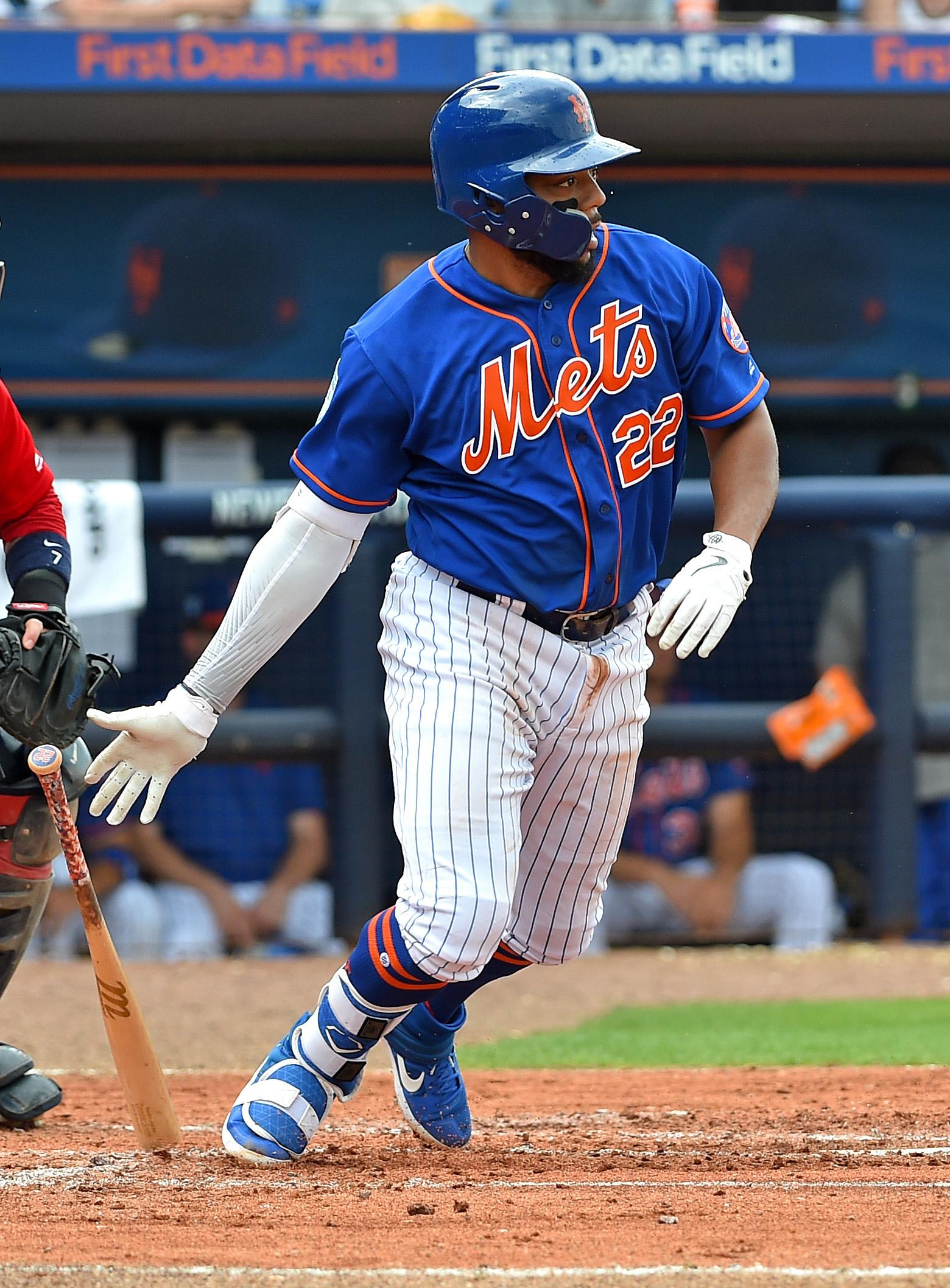 New York Mets first baseman Dominic Smith hits a single against the Boston Red Sox at First Data Field.