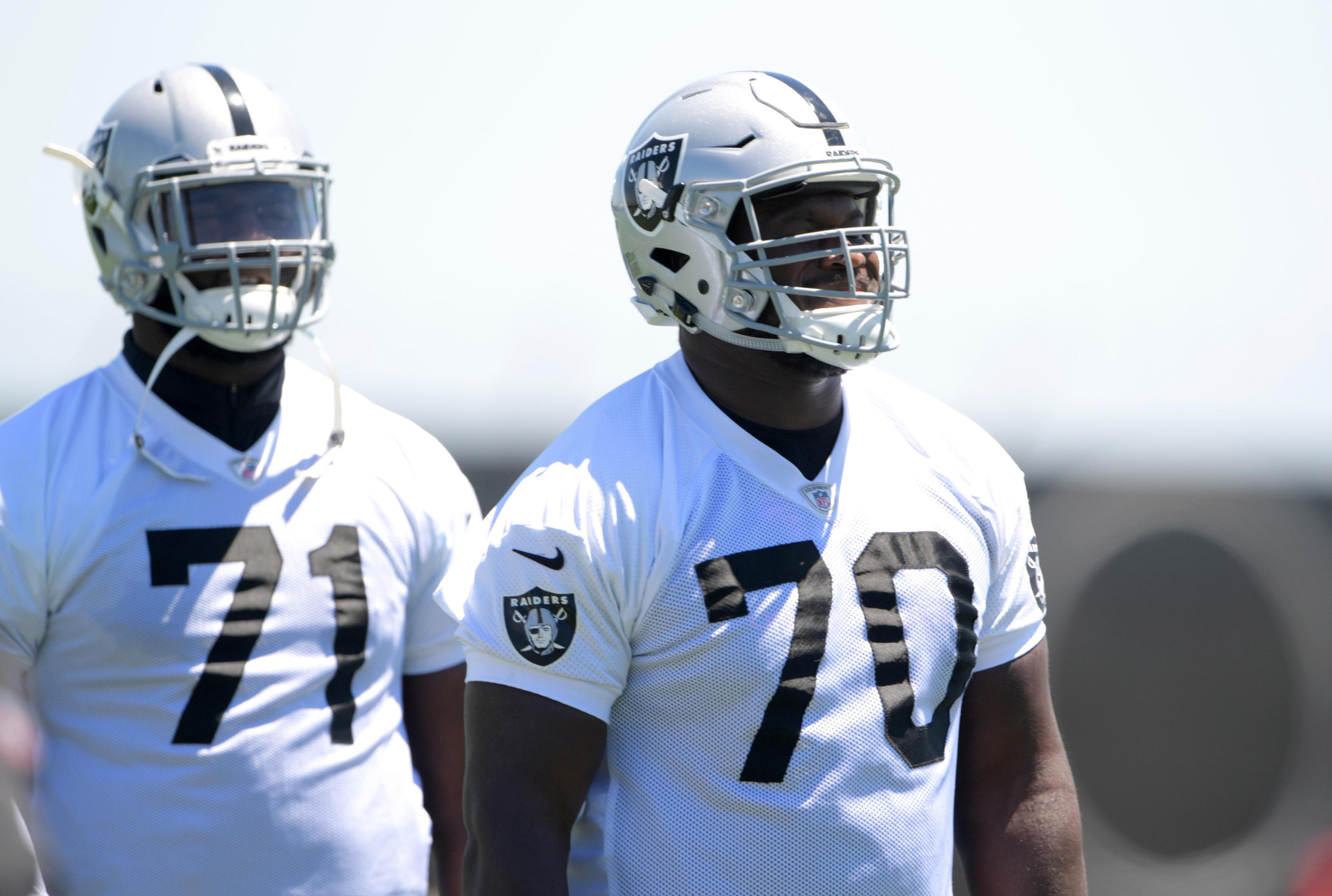 Jun 12, 2018; Alameda, CA, USA: Oakland Raiders tackle Kelechi Osemele (70) and tackle David Sharpe (71) during minicamp at the Raiders headquarters. Mandatory Credit: Kirby Lee-USA TODAY Sports