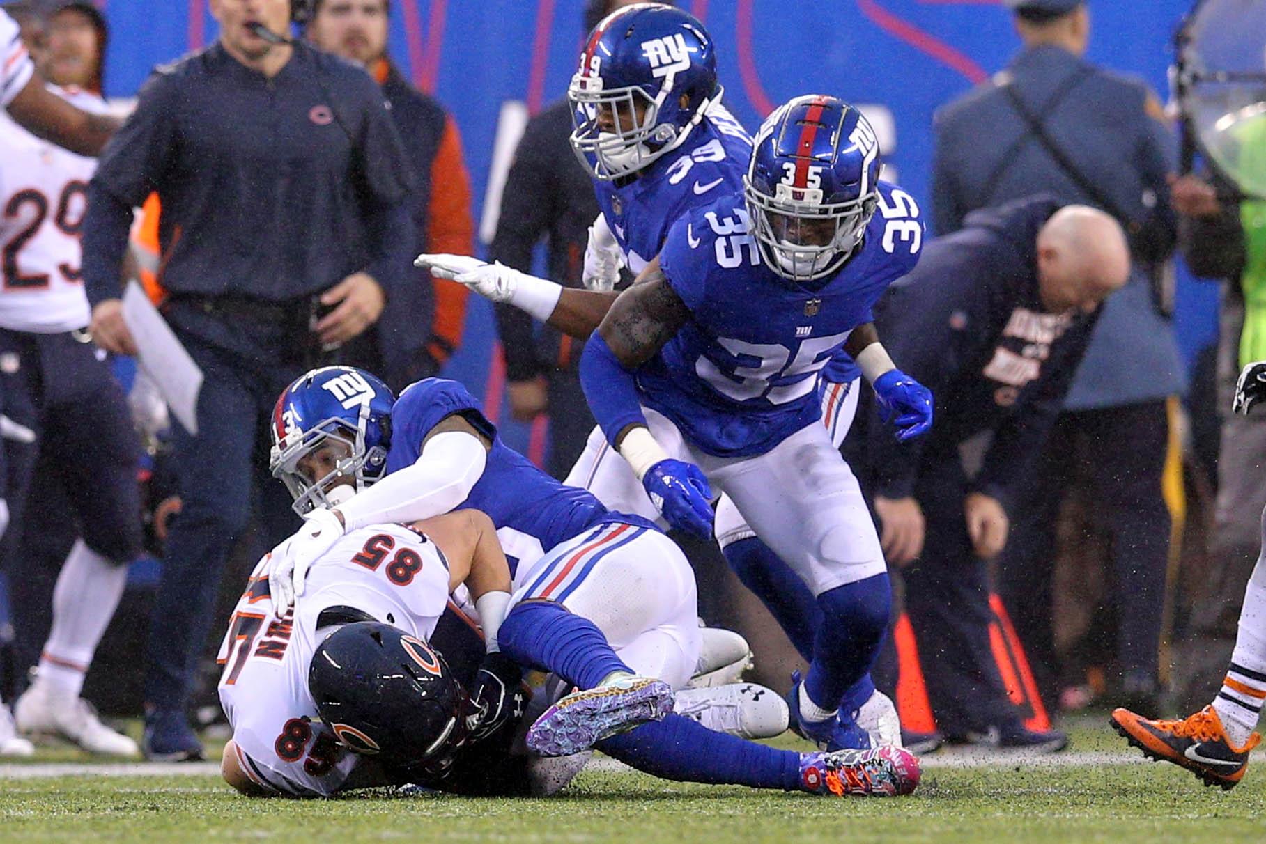 Chicago Bears tight end Daniel Brown recovers an onside kick in front of New York Giants wide receiver Odell Beckham Jr. during the fourth quarter at MetLife Stadium.