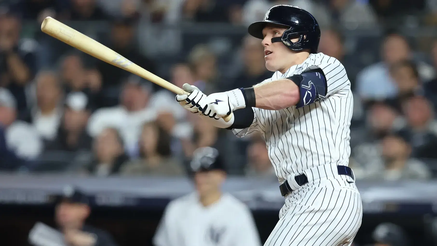 Oct 11, 2022; Bronx, New York, USA; New York Yankees center fielder Harrison Bader (22) hits a home run during the third inning against the Cleveland Guardians in game one of the ALDS for the 2022 MLB Playoffs at Yankee Stadium. / Brad Penner-USA TODAY Sports