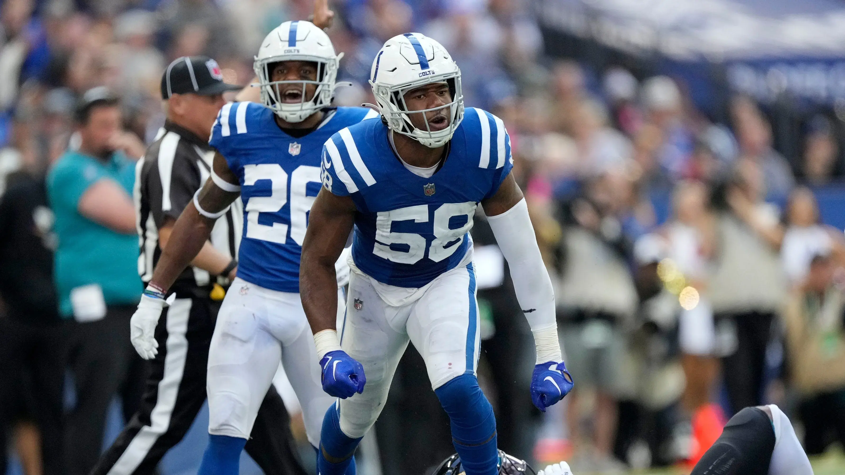 Indianapolis Colts safety Rodney McLeod Jr. (26) and Indianapolis Colts linebacker Bobby Okereke (58) celebrate a defensive stop Sunday, Oct. 16, 2022, during a game against the Jacksonville Jaguars at Lucas Oil Stadium in Indianapolis. / © Robert Scheer/IndyStar / USA TODAY NETWORK