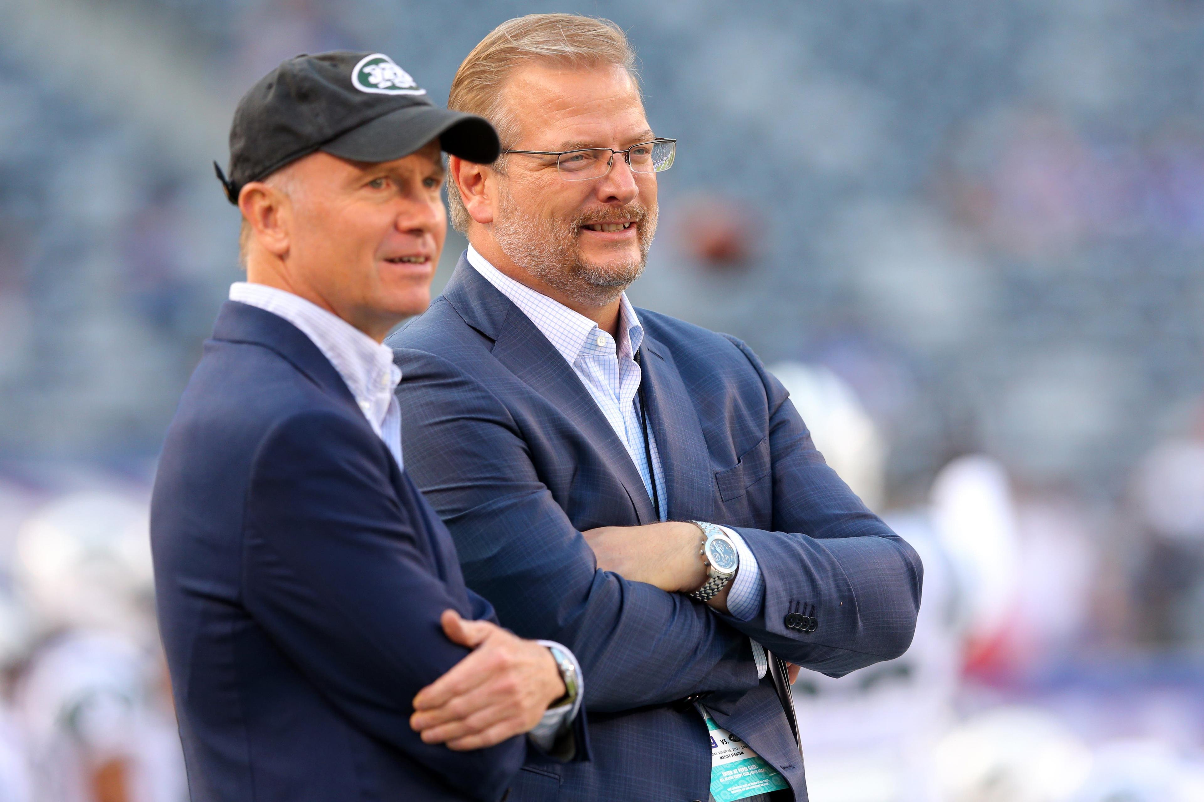 Aug 26, 2017; East Rutherford, NJ, USA; New York Jets acting ceo Christopher Wold Johnson (left) talks to general manager Mike Maccagnan before a preseason game against the New York Giants at MetLife Stadium. Mandatory Credit: Brad Penner-USA TODAY Sports / Brad Penner