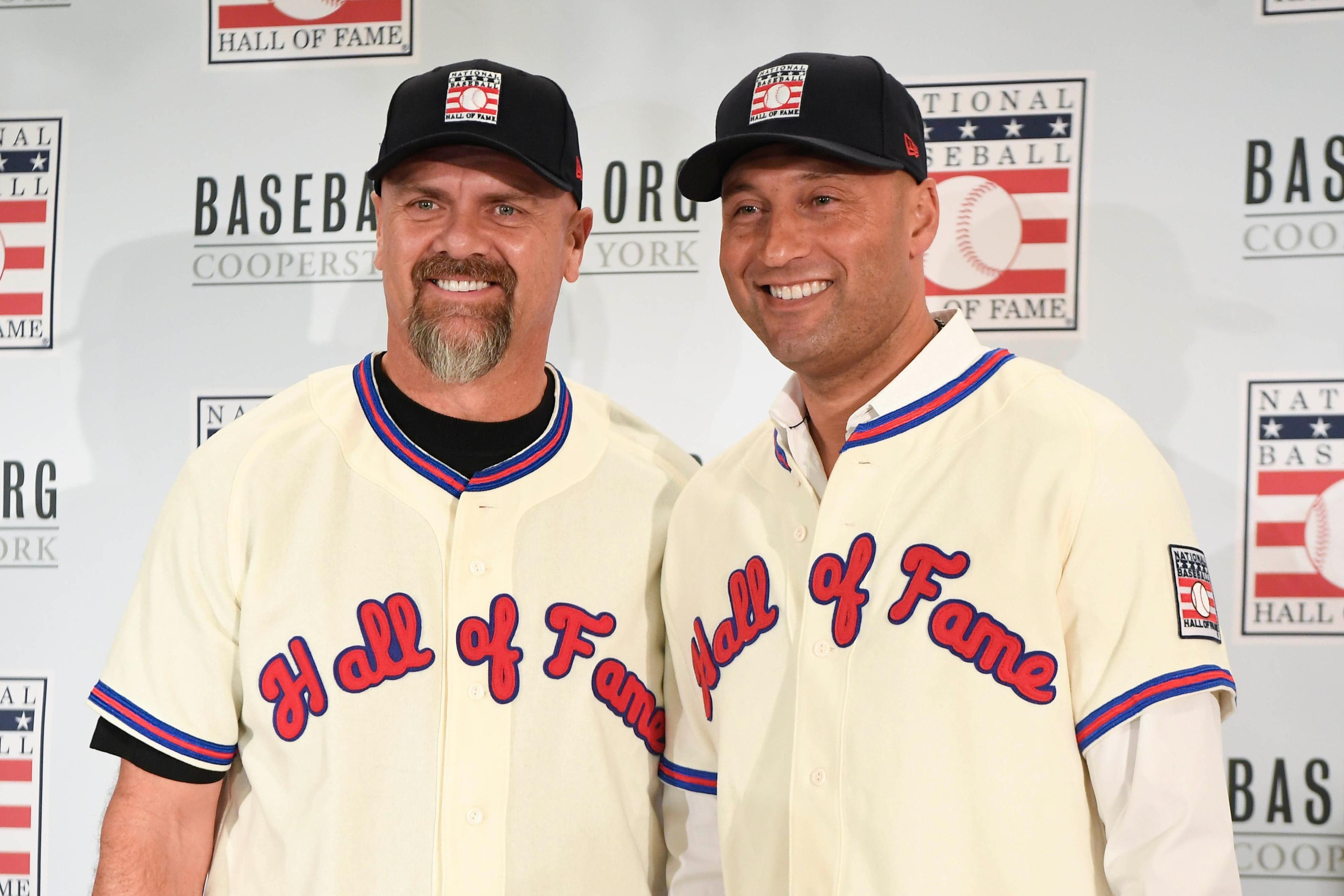 Jan 22, 2020; New York, New York, USA; New Hall of Fame 2020 inductees Larry Walker, left, and Derek Jeter pose for photos at St. Regis Hotel. Mandatory Credit: Danielle Parhizkaran-USA TODAY Sports / Danielle Parhizkaran