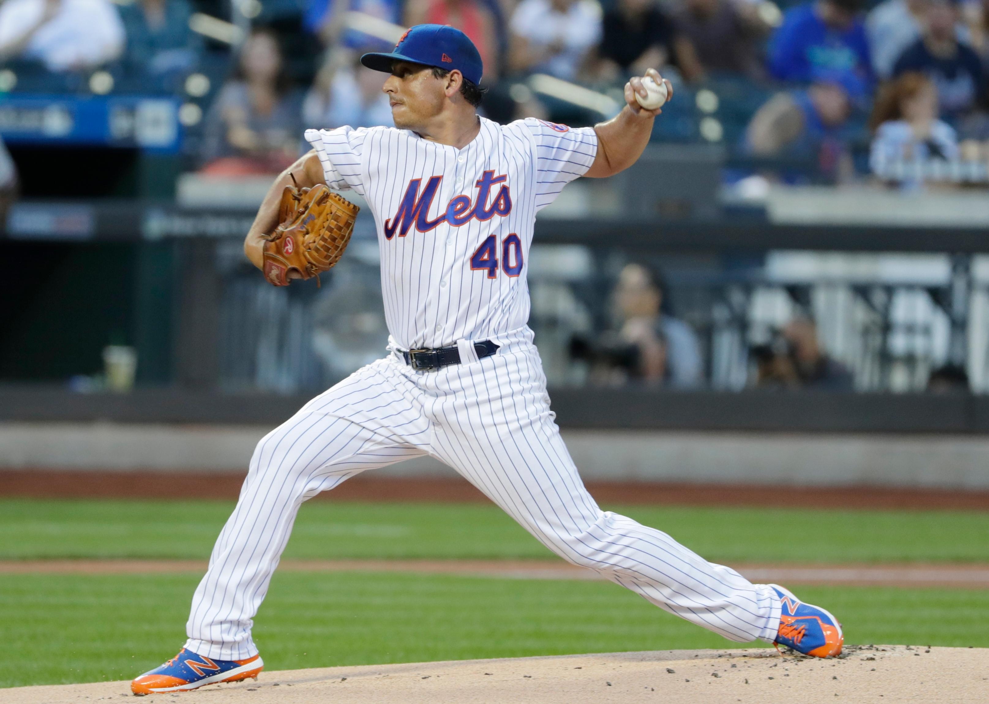 New York Mets' Jason Vargas (40) delivers a pitch during the first inning of a baseball game against the Atlanta Braves Thursday, Aug. 2, 2018, in New York. (AP Photo/Frank Franklin II)