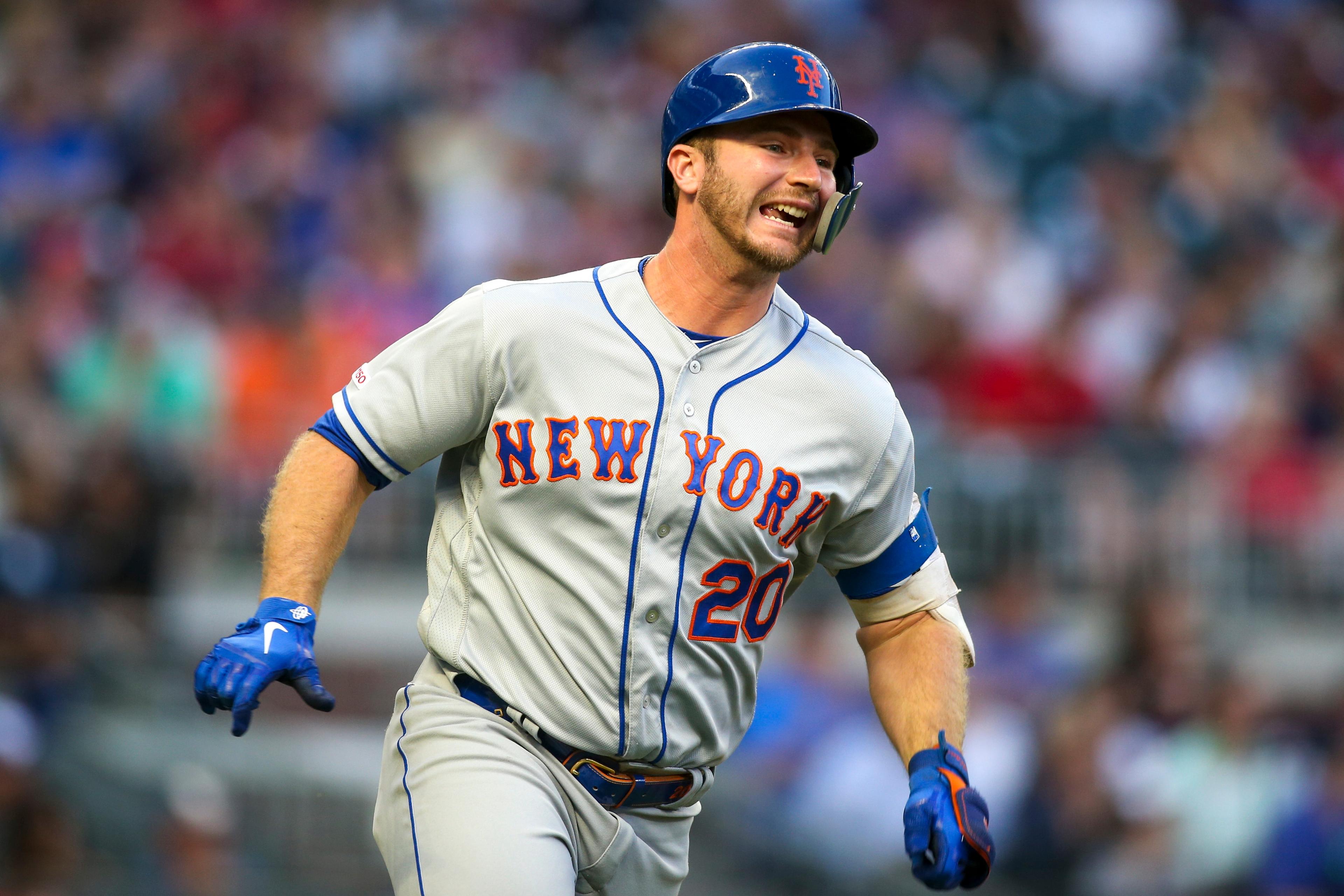 Apr 13, 2019; Atlanta, GA, USA; New York Mets first baseman Pete Alonso (20) hits a double against the Atlanta Braves in the first inning at SunTrust Park. Mandatory Credit: Brett Davis-USA TODAY Sports