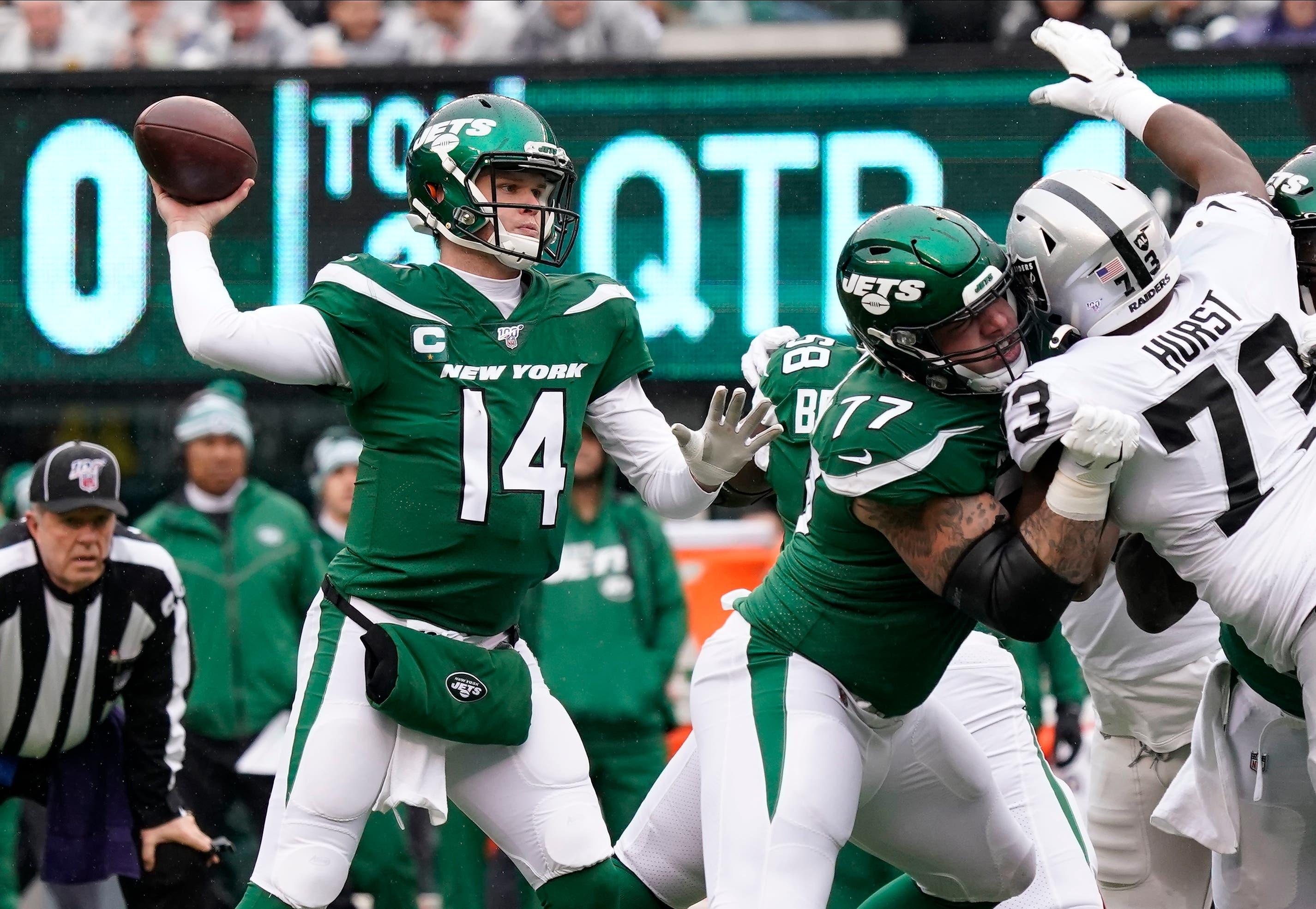 Nov 24, 2019; East Rutherford, NJ, USA; New York Jets quarterback Sam Darnold (14) throws against the Oakland Raiders in the first half at MetLife Stadium. Mandatory Credit: Robert Deutsch-USA TODAY Sportsundefined