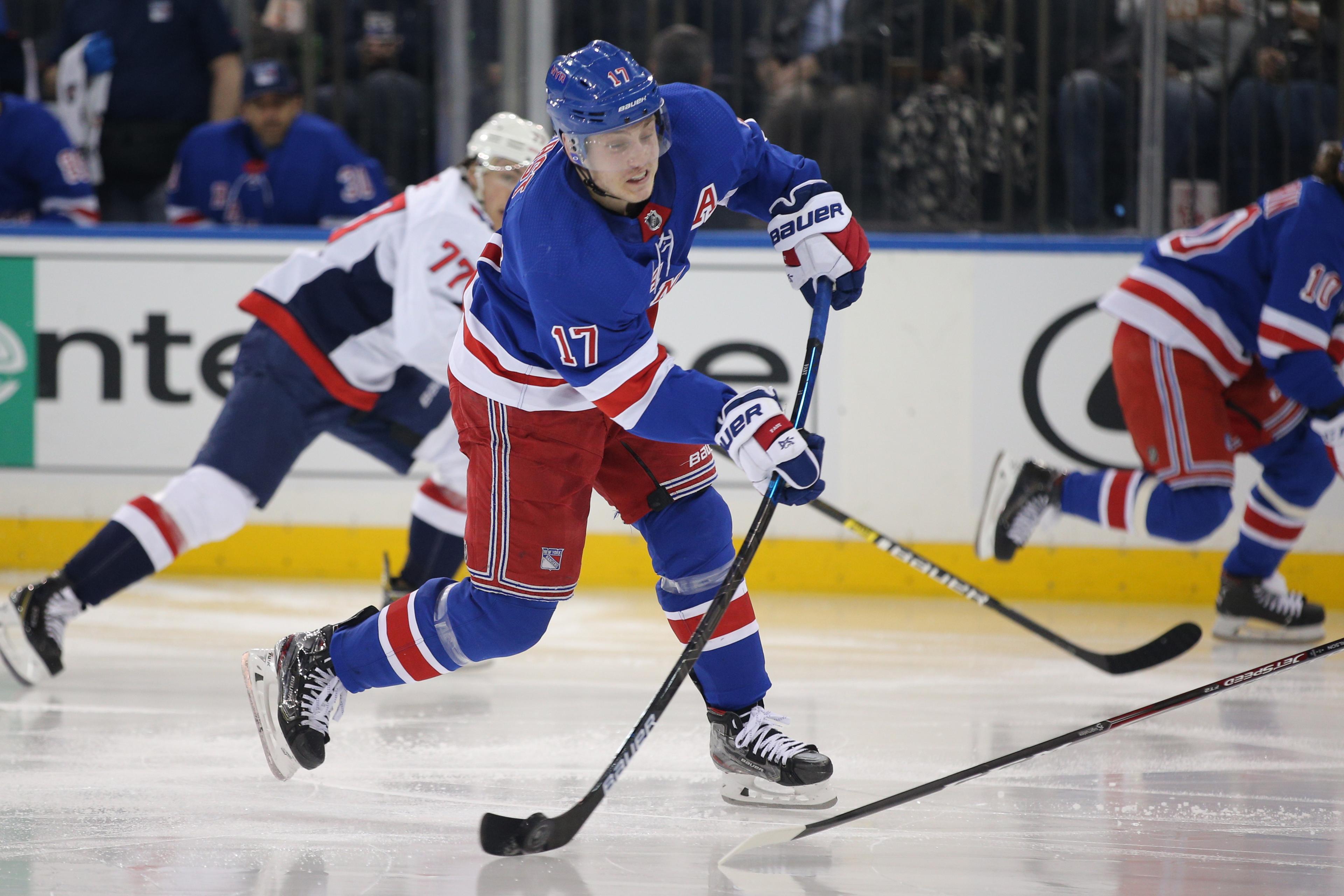 New York Rangers right wing Jesper Fast (17) shoots against the Washington Capitals during the second period at Madison Square Garden. / Brad Penner - USA Today Sports