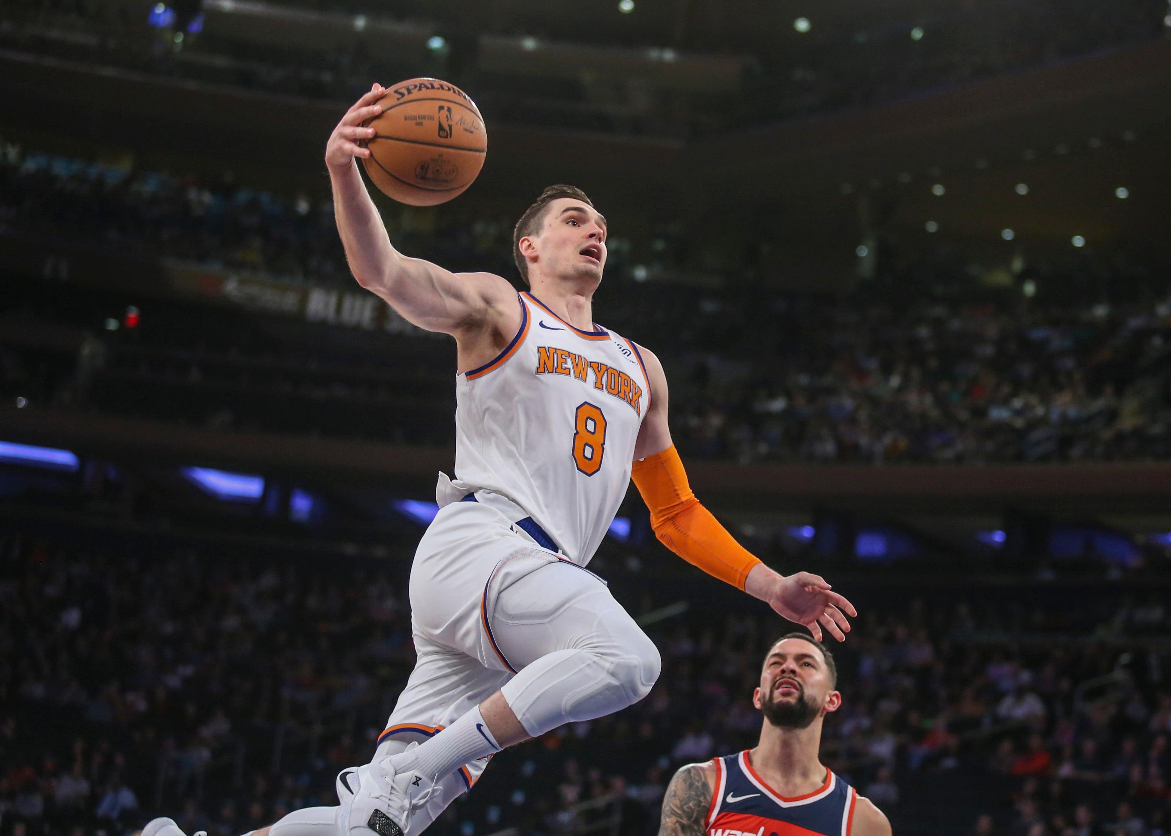 Oct 8, 2018; New York, NY, USA; New York Knicks forward Mario Hezonja (8) leaps for a dunk in the fourth quarter against the Washington Wizards at Madison Square Garden. Mandatory Credit: Wendell Cruz-USA TODAY Sports / Wendell Cruz