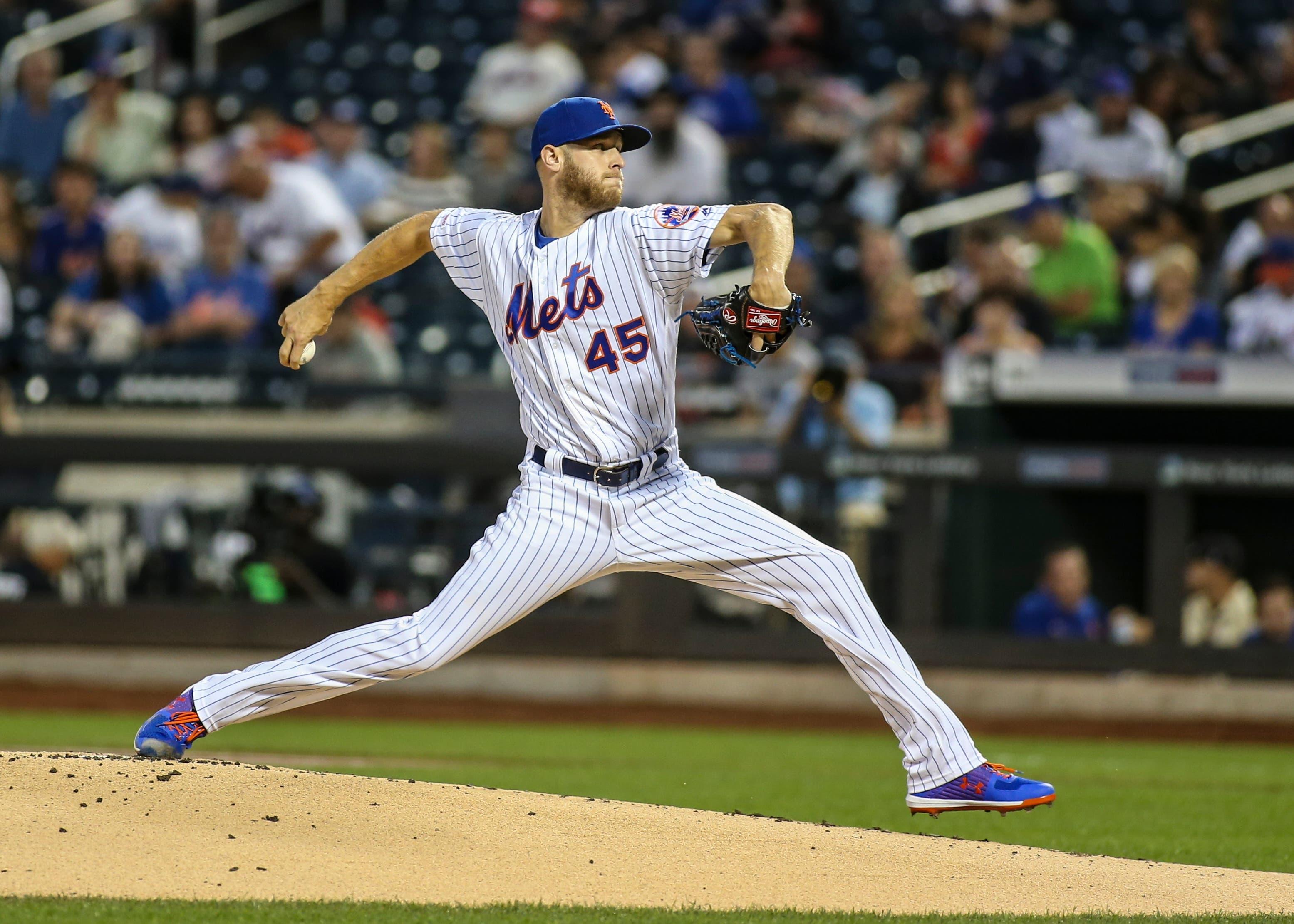 Sep 15, 2019; New York City, NY, USA; New York Mets pitcher Zack Wheeler (45) pitches in the first inning against the Los Angeles Dodgers at Citi Field. Mandatory Credit: Wendell Cruz-USA TODAY Sportsundefined