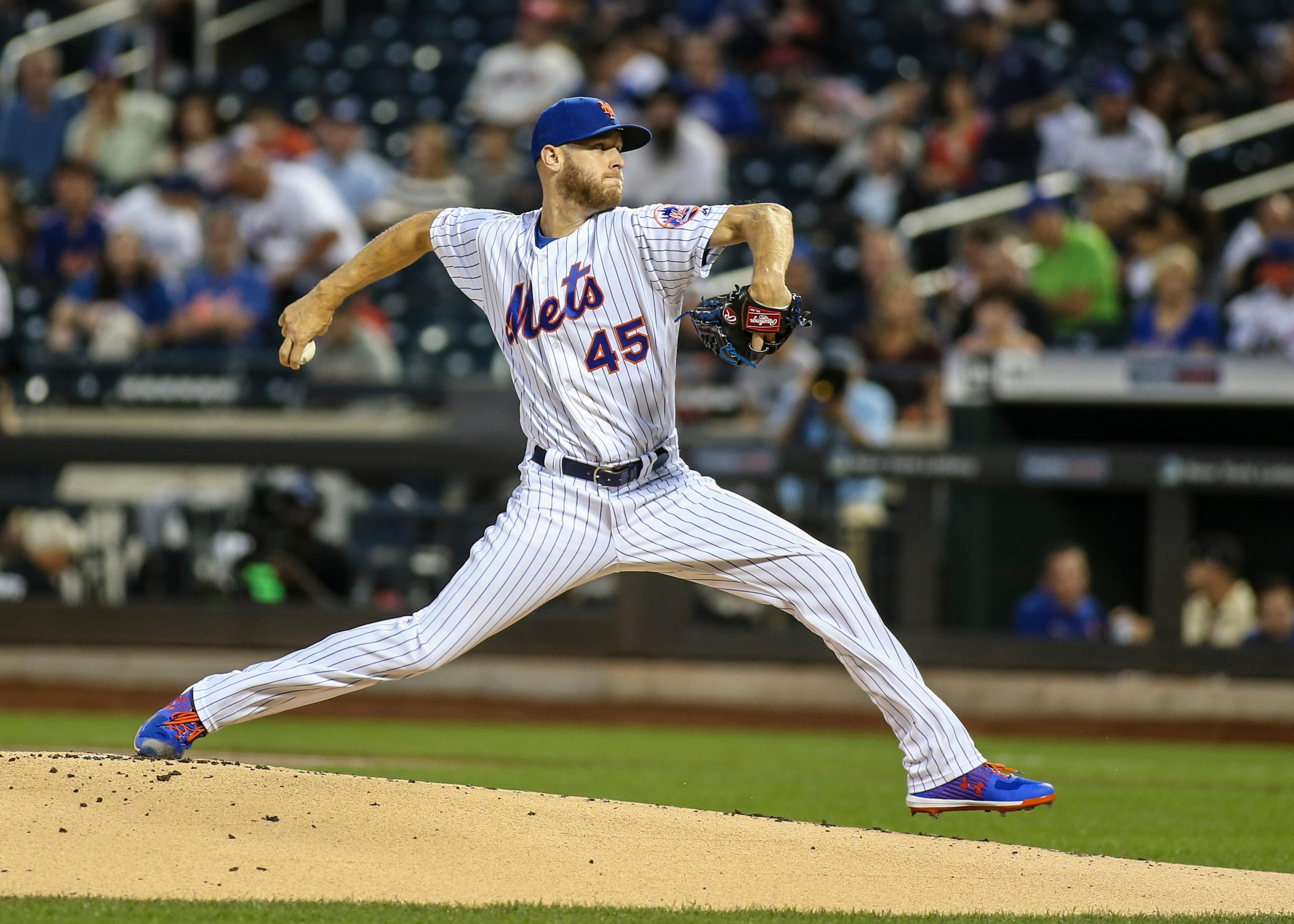 Sep 15, 2019; New York City, NY, USA; New York Mets pitcher Zack Wheeler (45) pitches in the first inning against the Los Angeles Dodgers at Citi Field. Mandatory Credit: Wendell Cruz-USA TODAY Sports