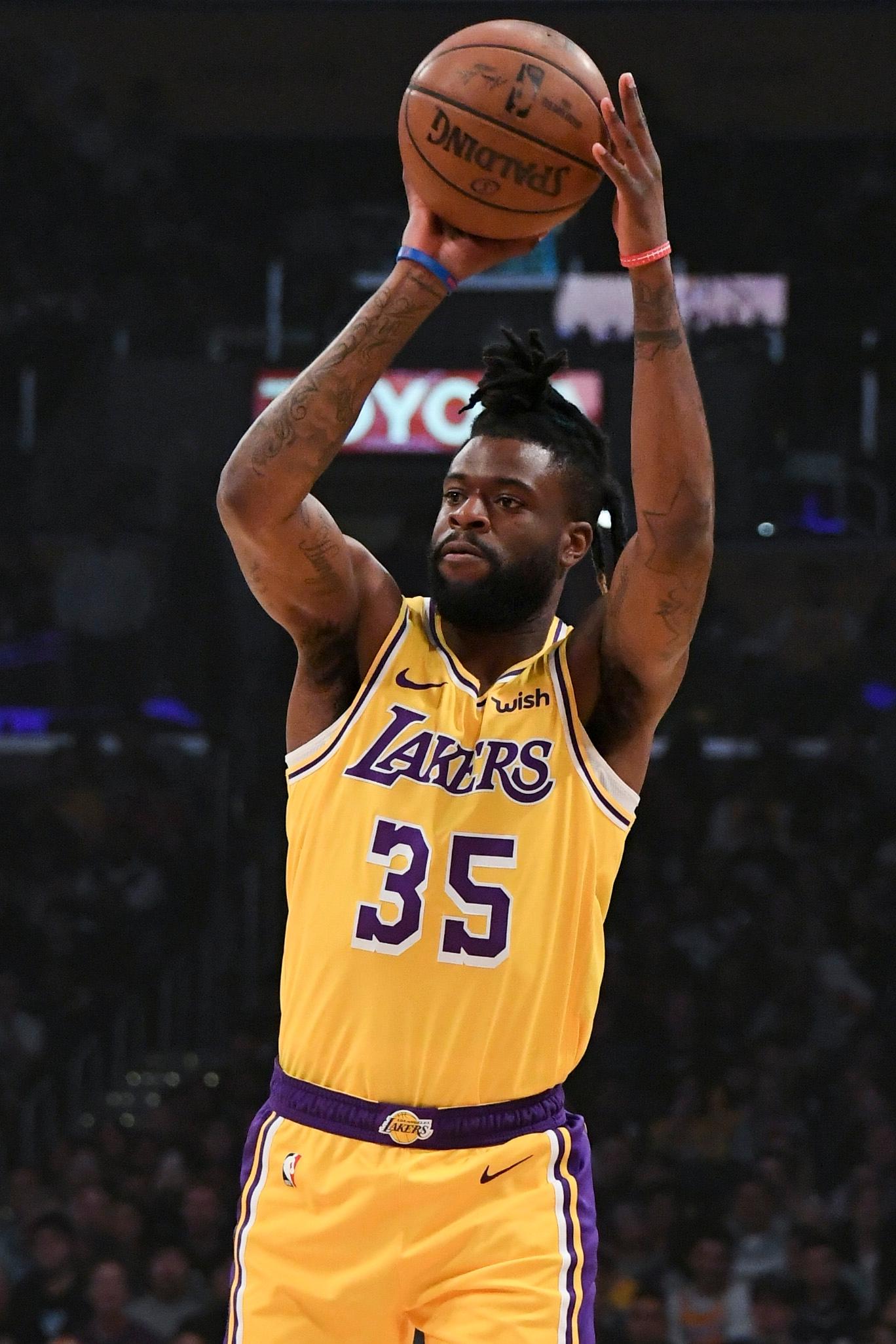 Mar 4, 2019; Los Angeles, CA, USA; Los Angeles Lakers guard Reggie Bullock (35) passes the ball during the first quarter against the Los Angeles Clippers at Staples Center. Mandatory Credit: Richard Mackson-USA TODAY Sports