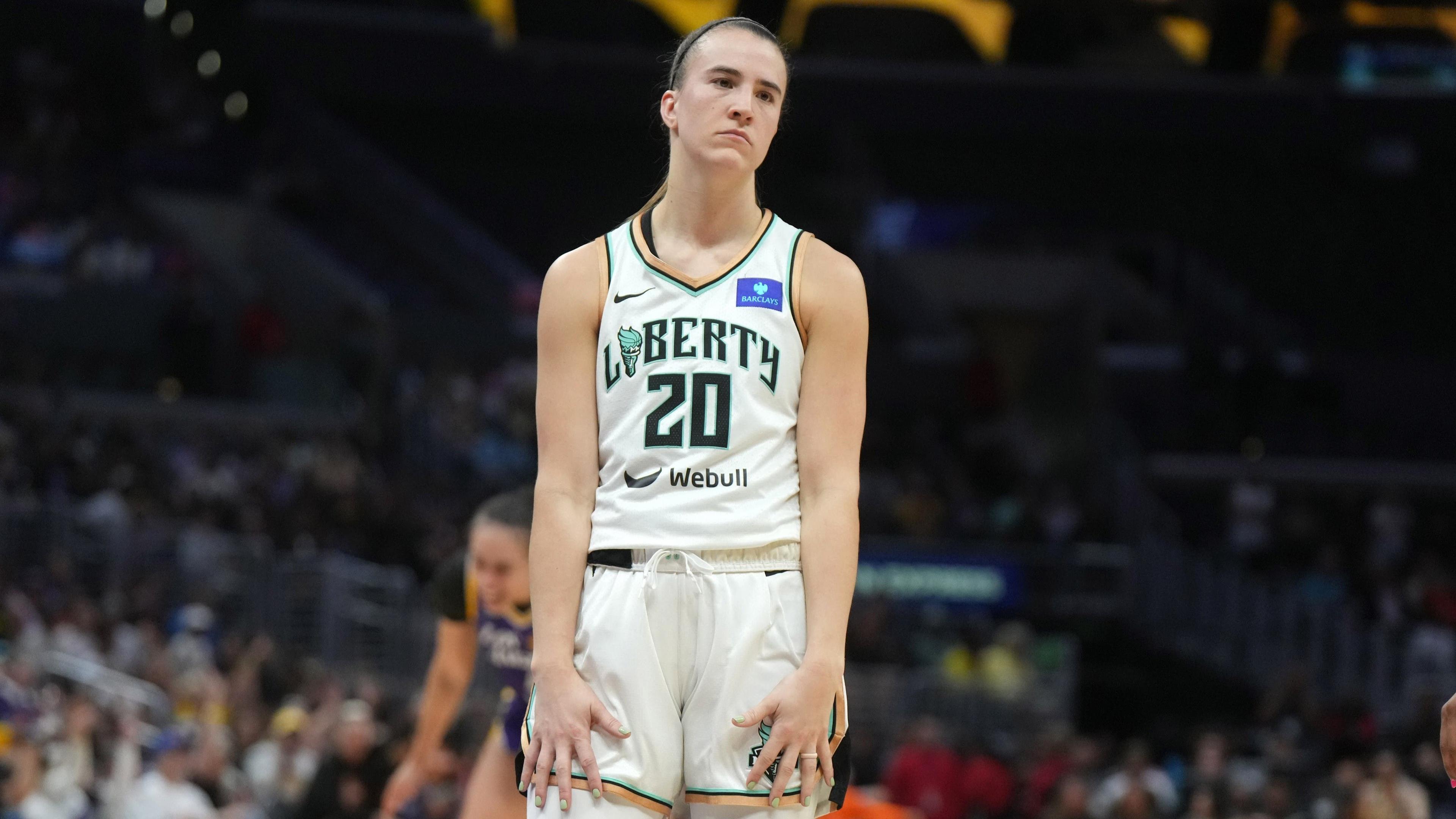 Aug 28, 2024; Los Angeles, California, USA; New York Liberty guard Sabrina Ionescu (20) reacts against the LA Sparks in the second half at Crypto.com Arena. / Kirby Lee-Imagn Images